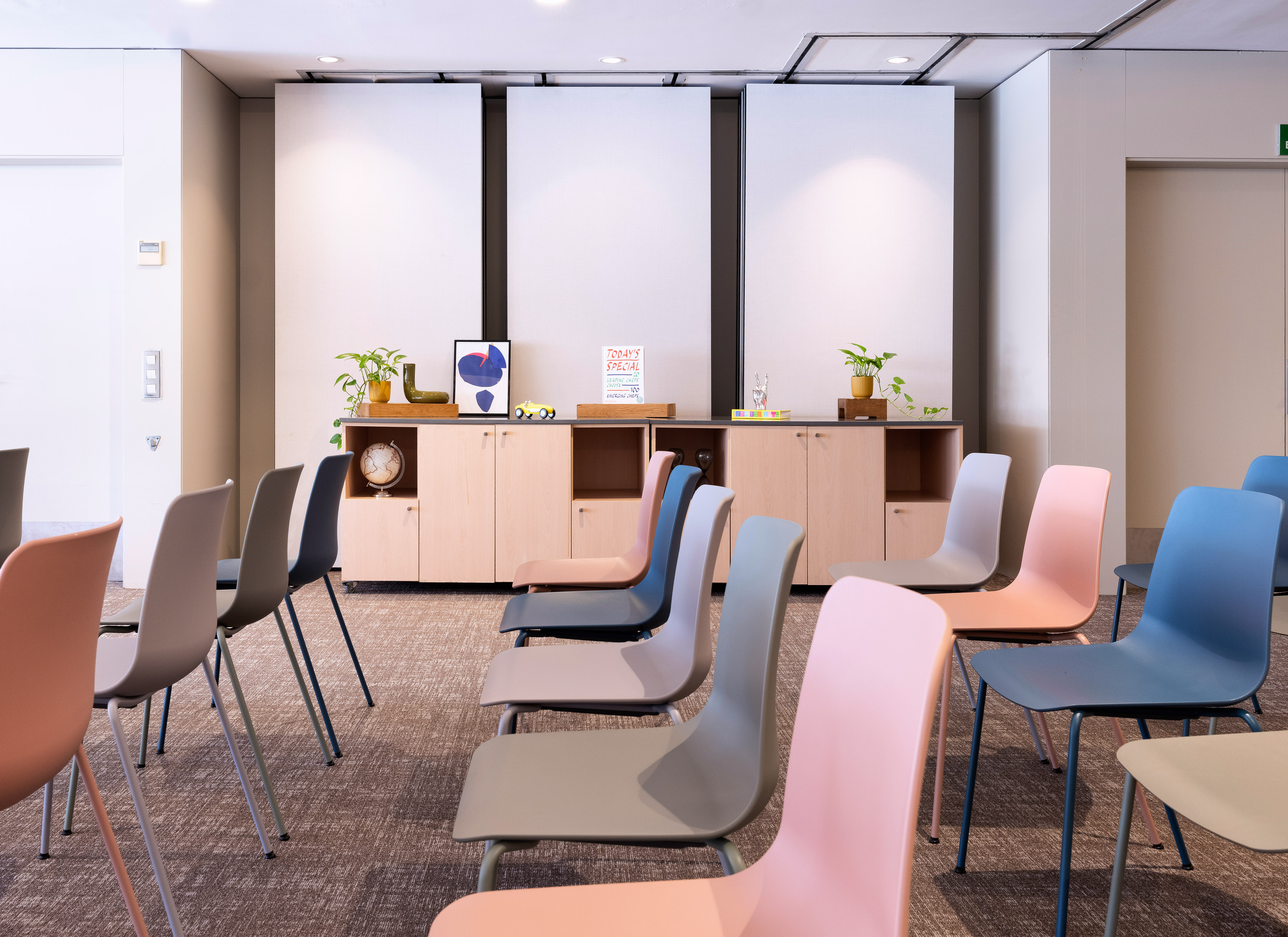 a room with chairs and a table
