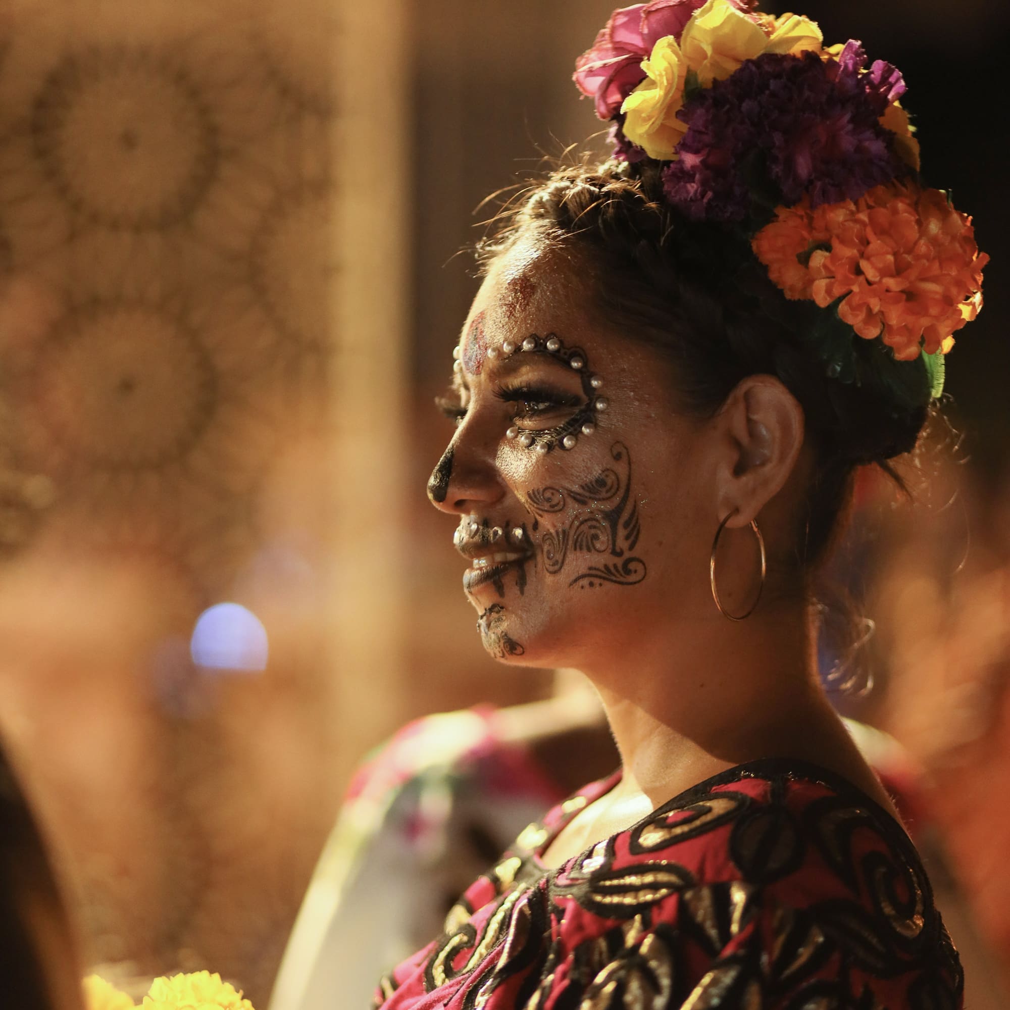a woman with flowers on her face