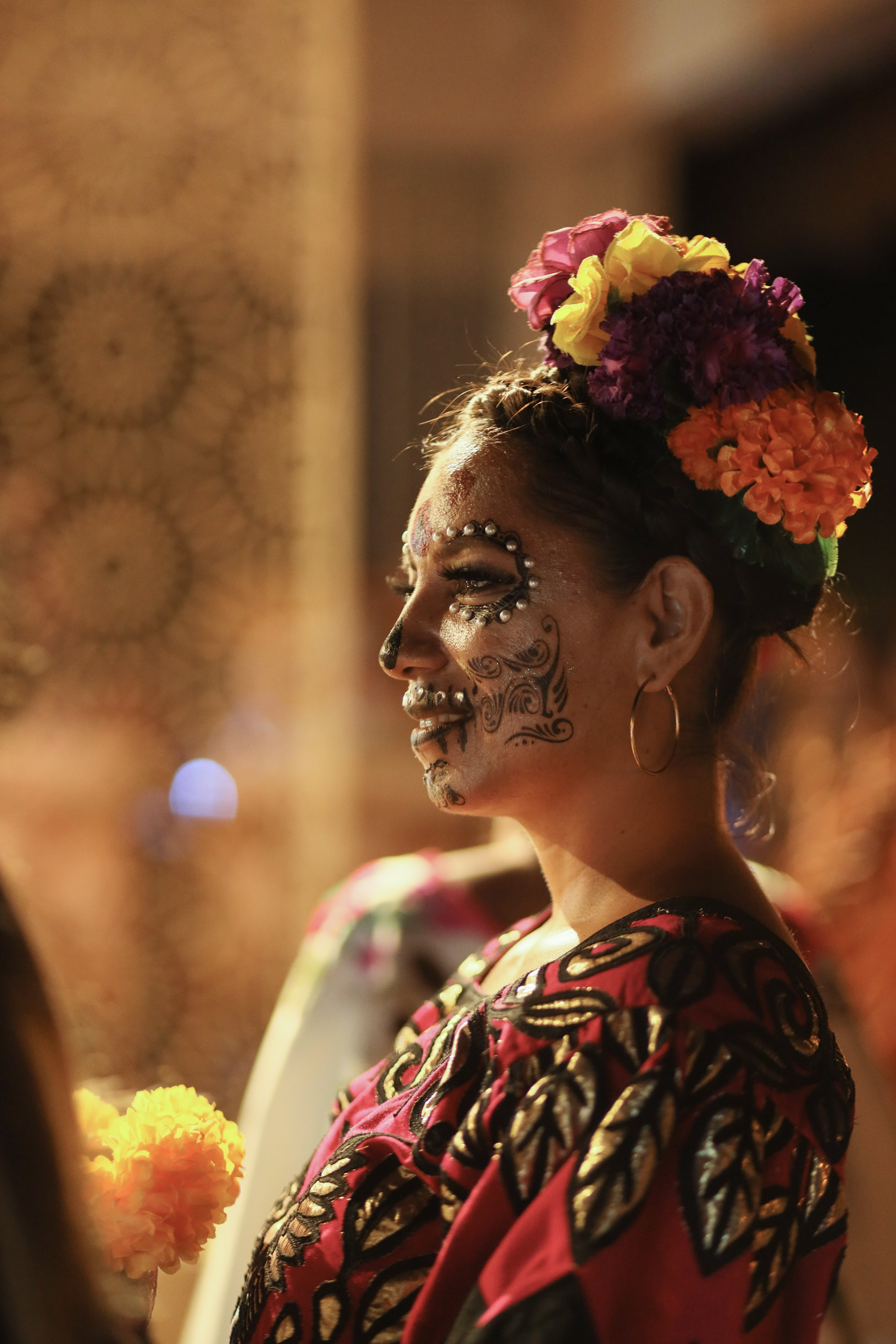 a woman with flowers on her face