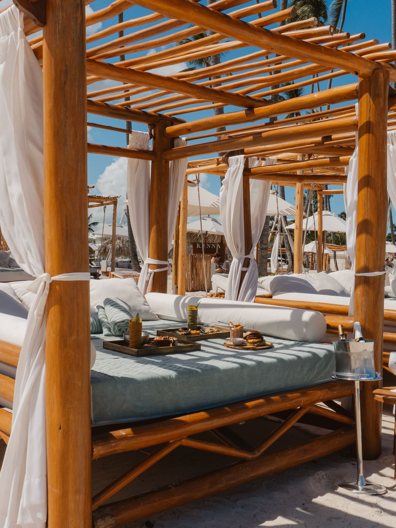 a wooden canopy on a beach