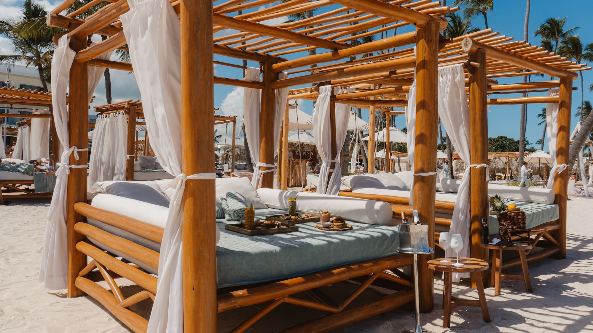 a wooden canopy on a beach
