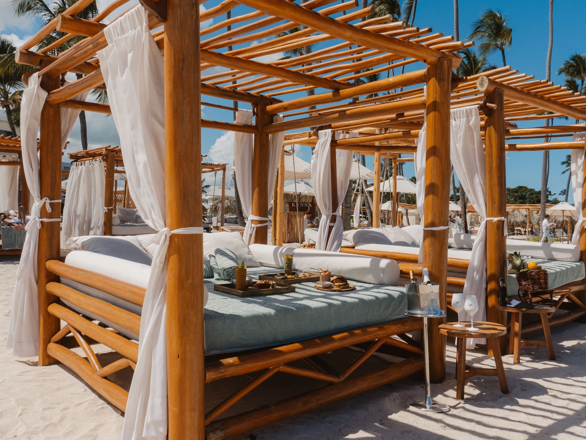 a wooden canopy on a beach