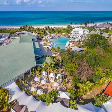 a resort with a pool and trees