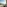 Resort balcony with ocean and mountain views, and coastal path.