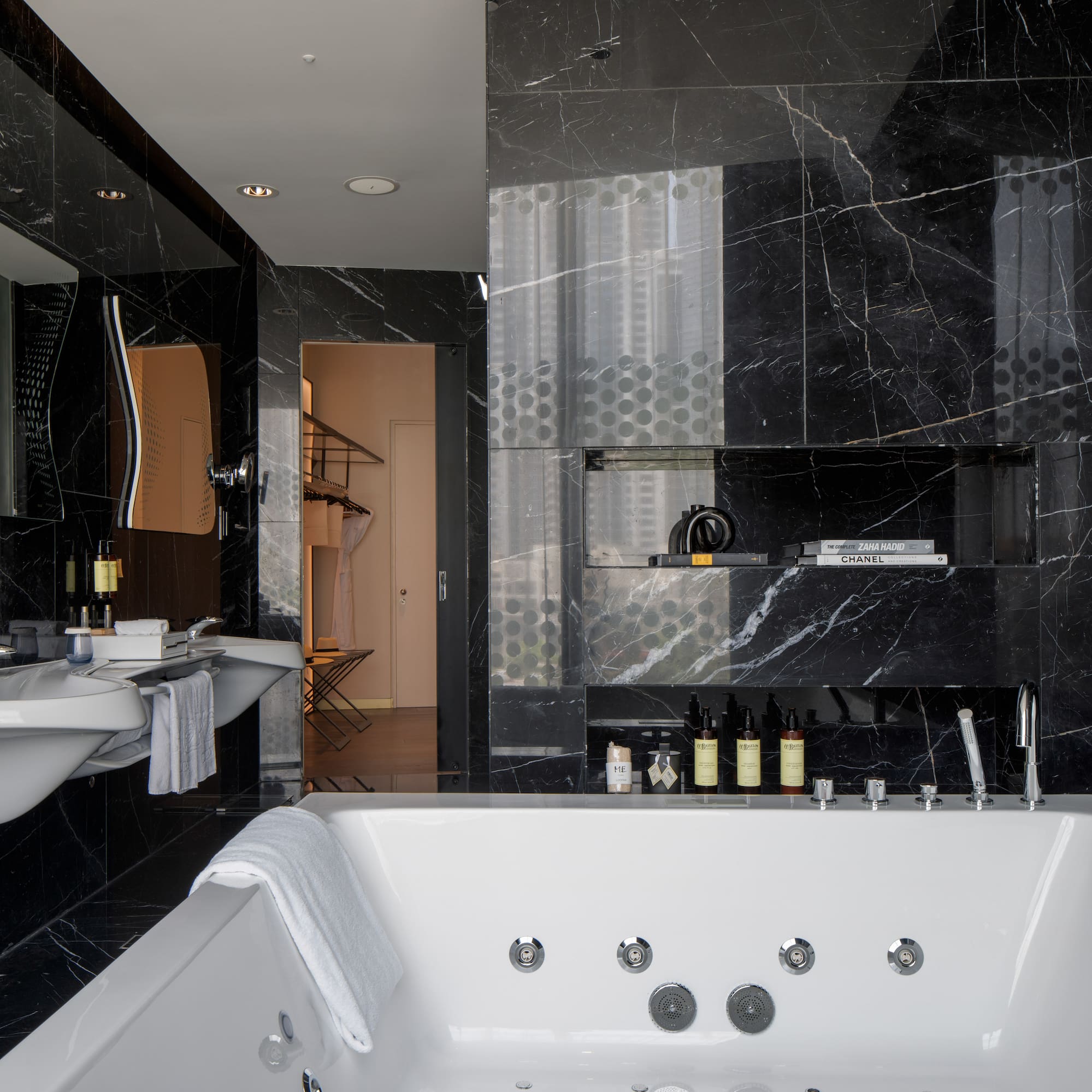 a bathroom with a bathtub and sink