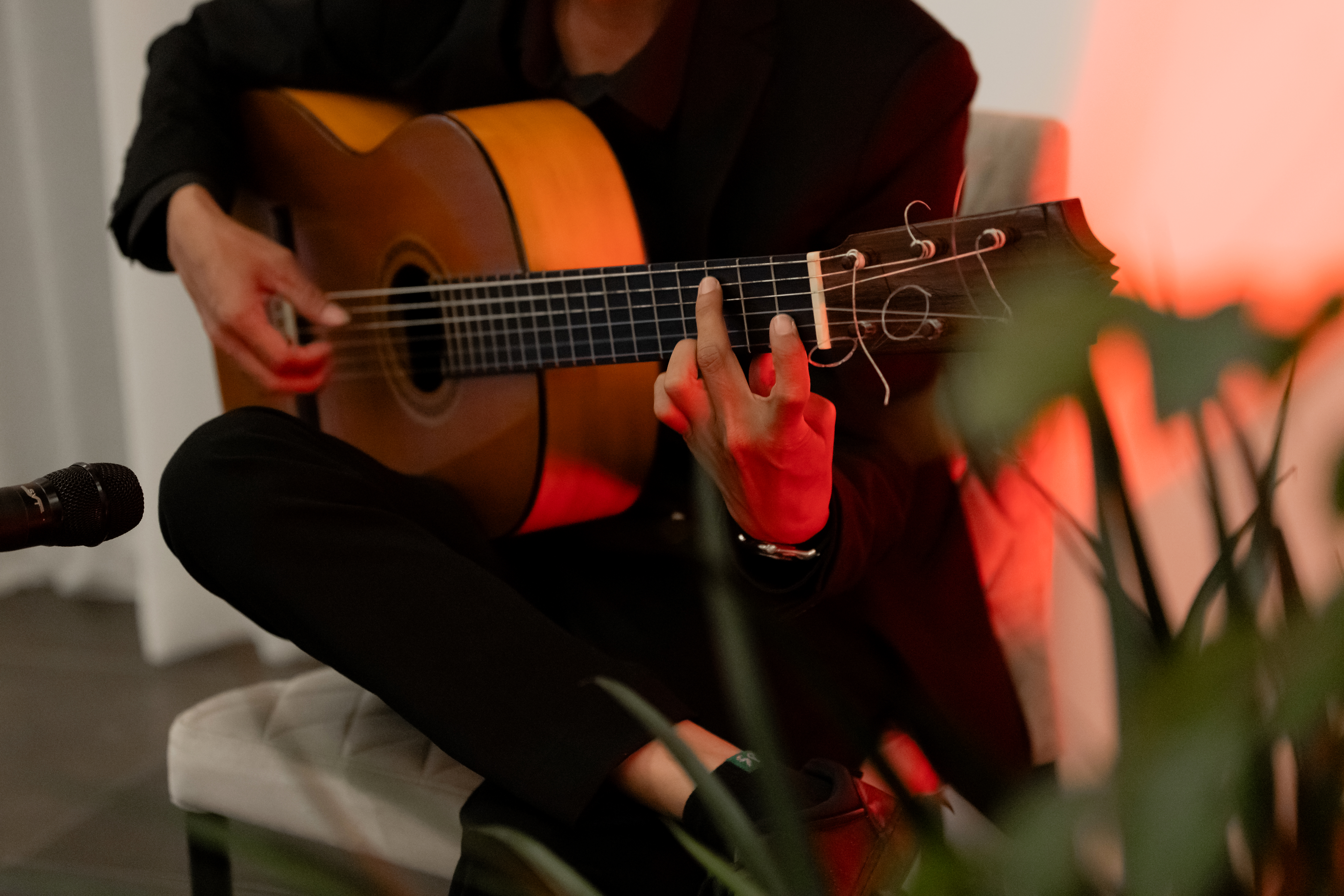 a person playing a guitar