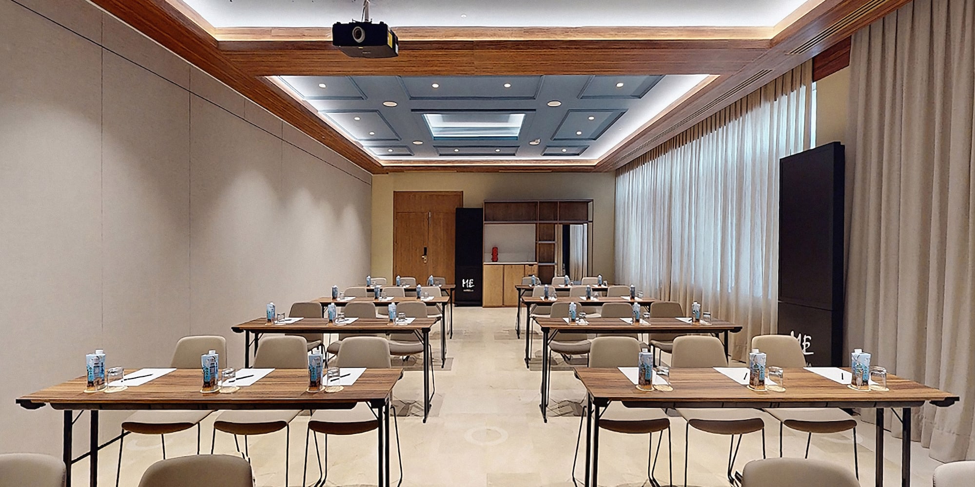 a room with tables and chairs