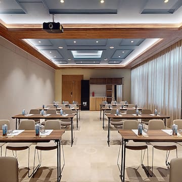 a room with tables and chairs