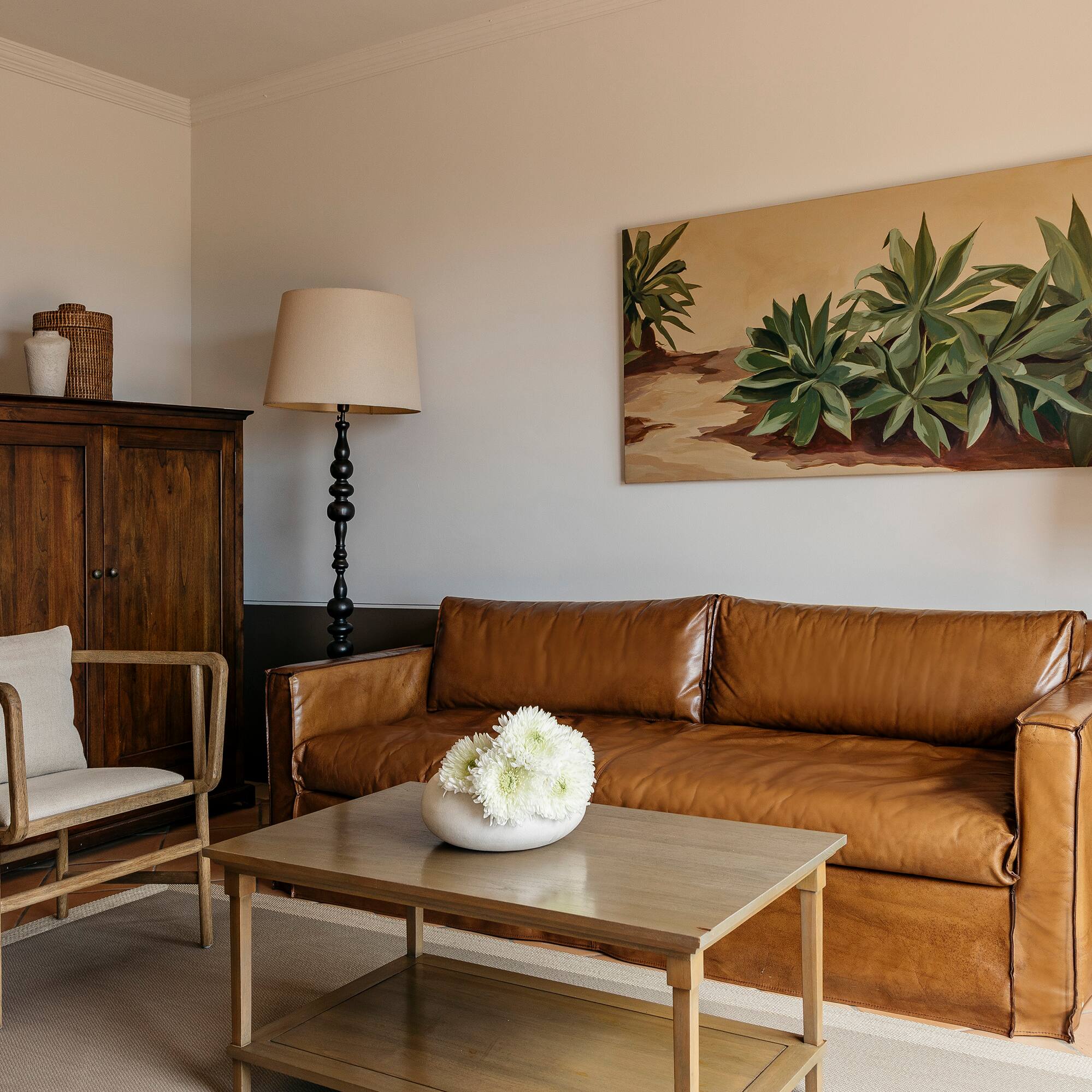 a living room with a couch and a table