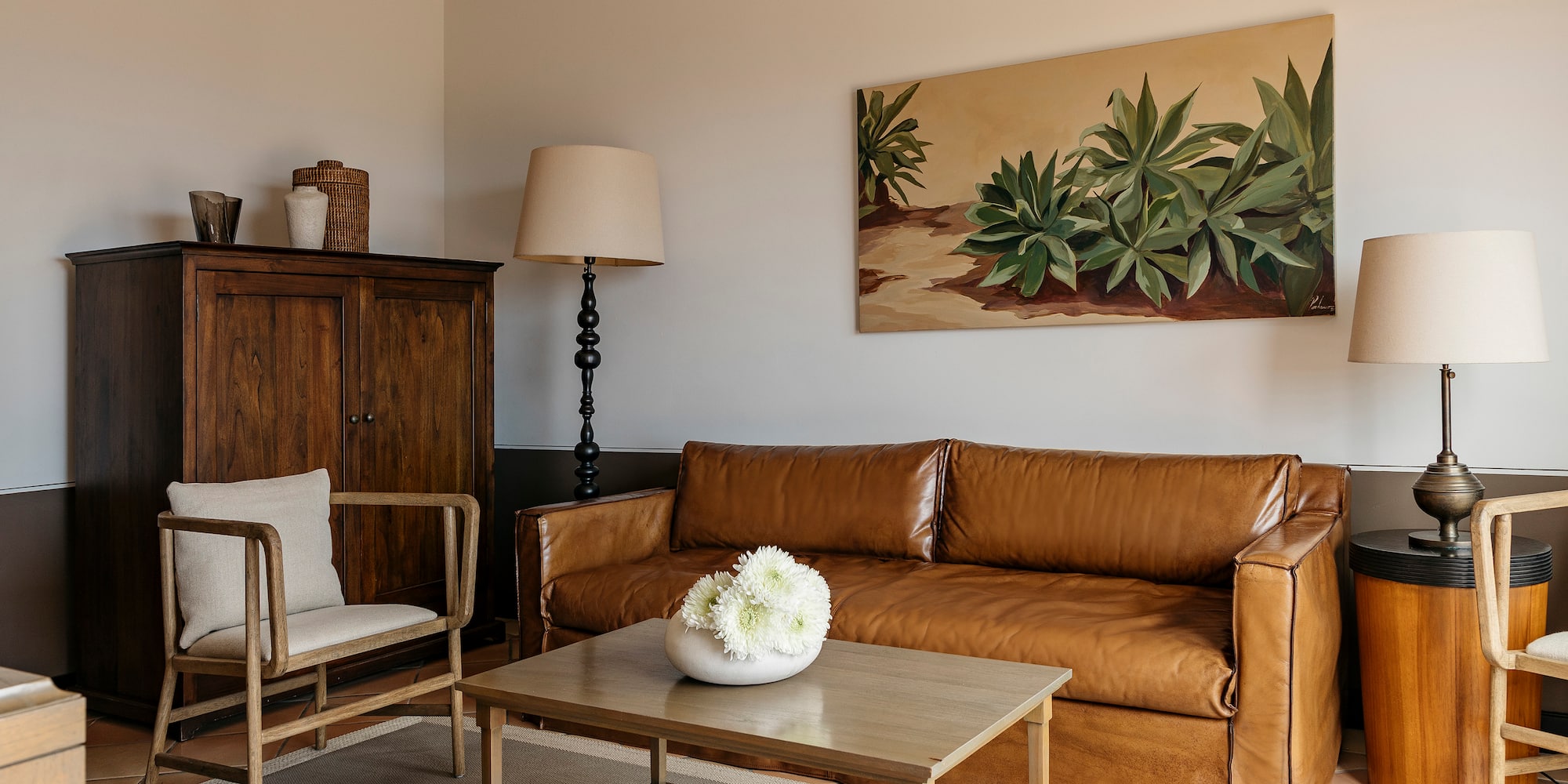 a living room with a couch and a table