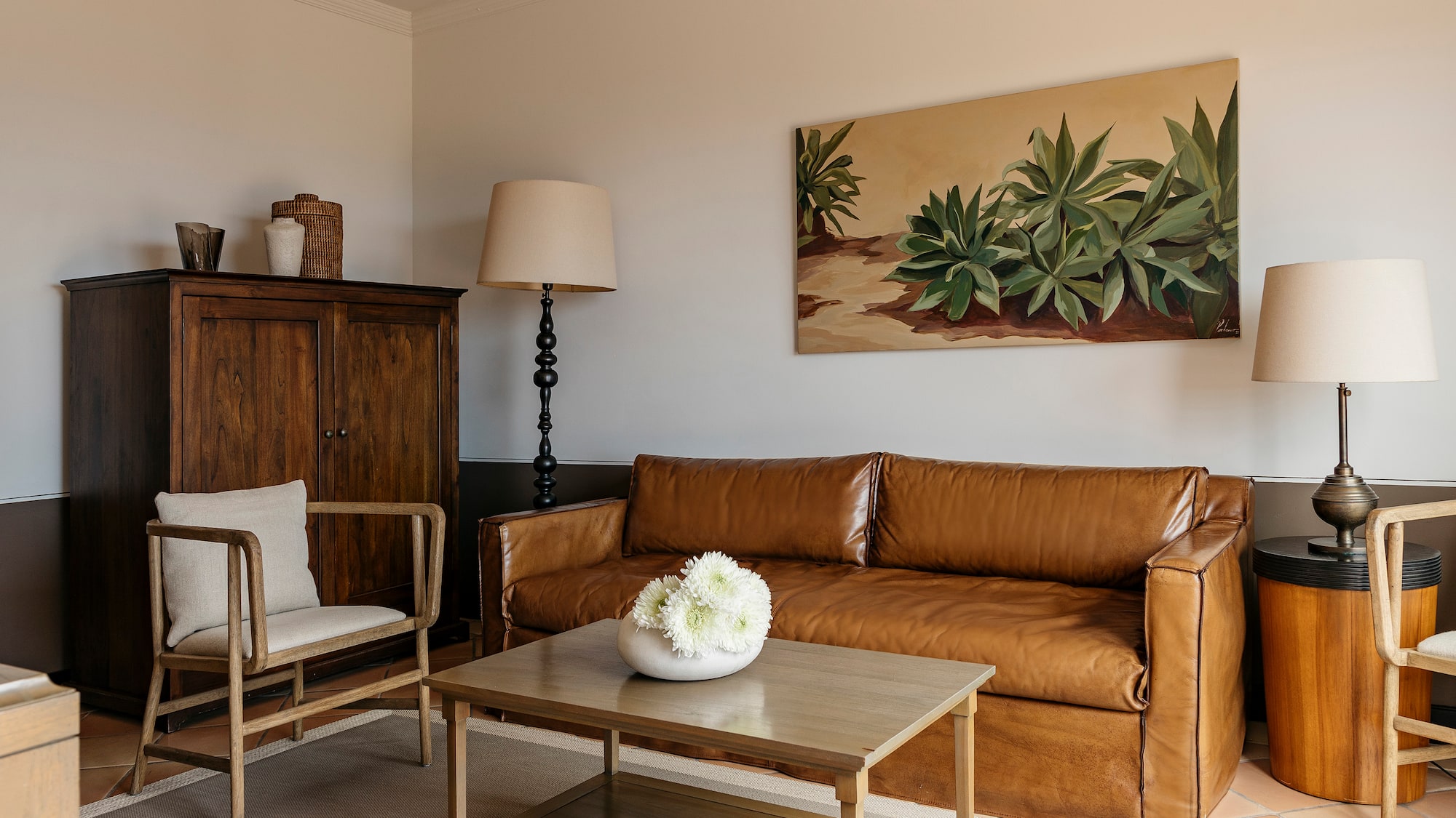 a living room with a couch and a table