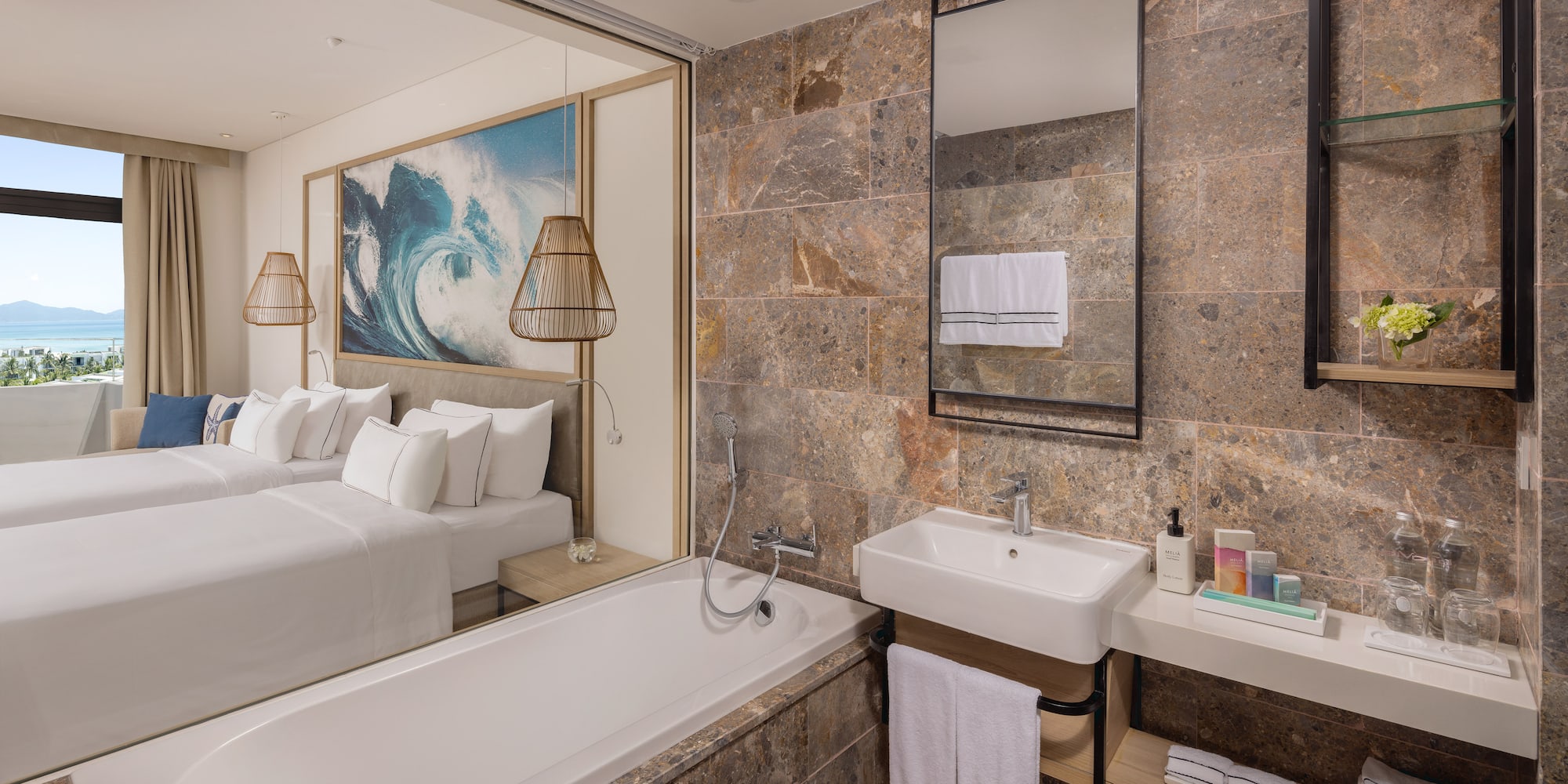 a bathroom with a bed and a bathtub