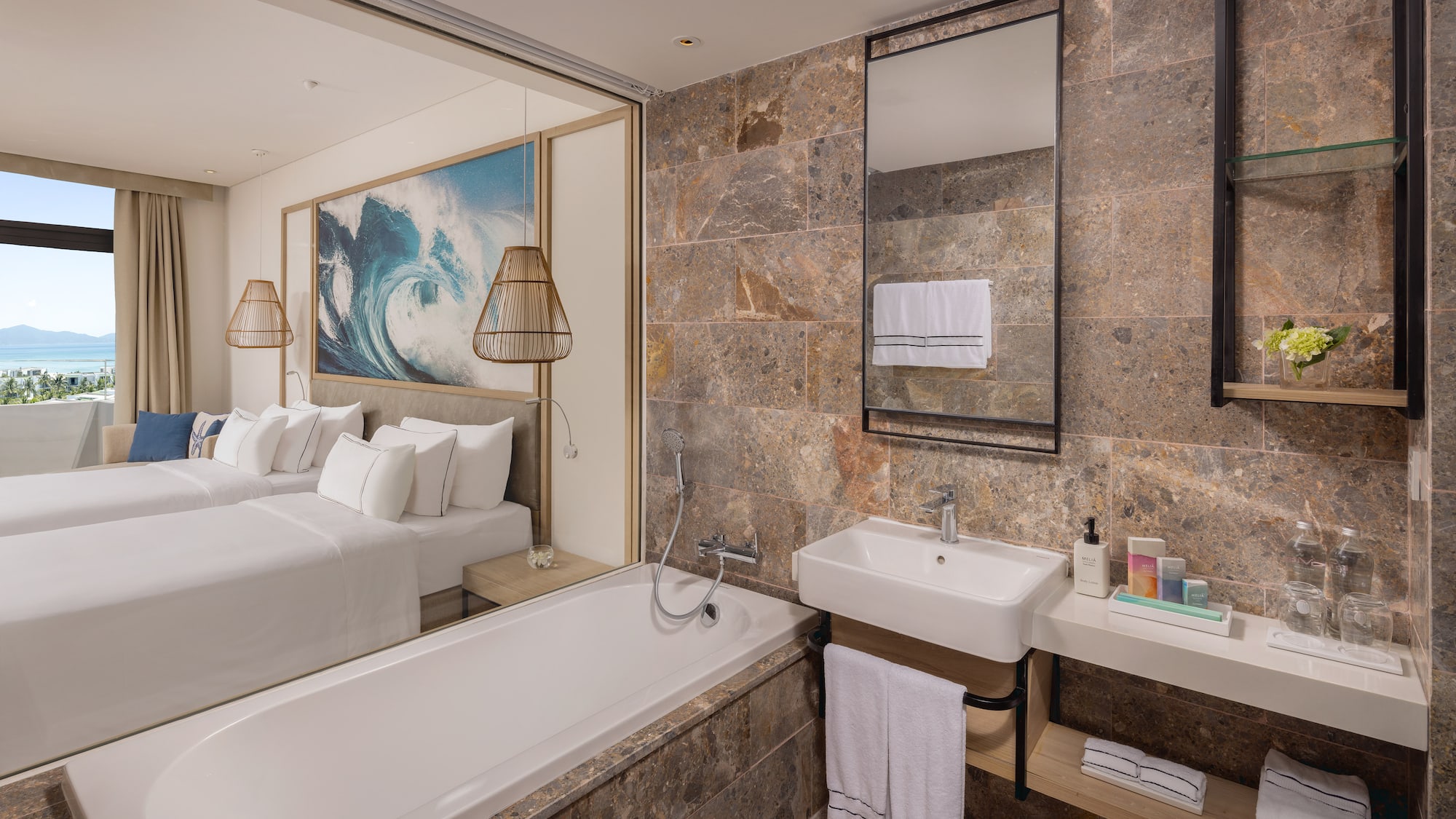 a bathroom with a bed and a bathtub