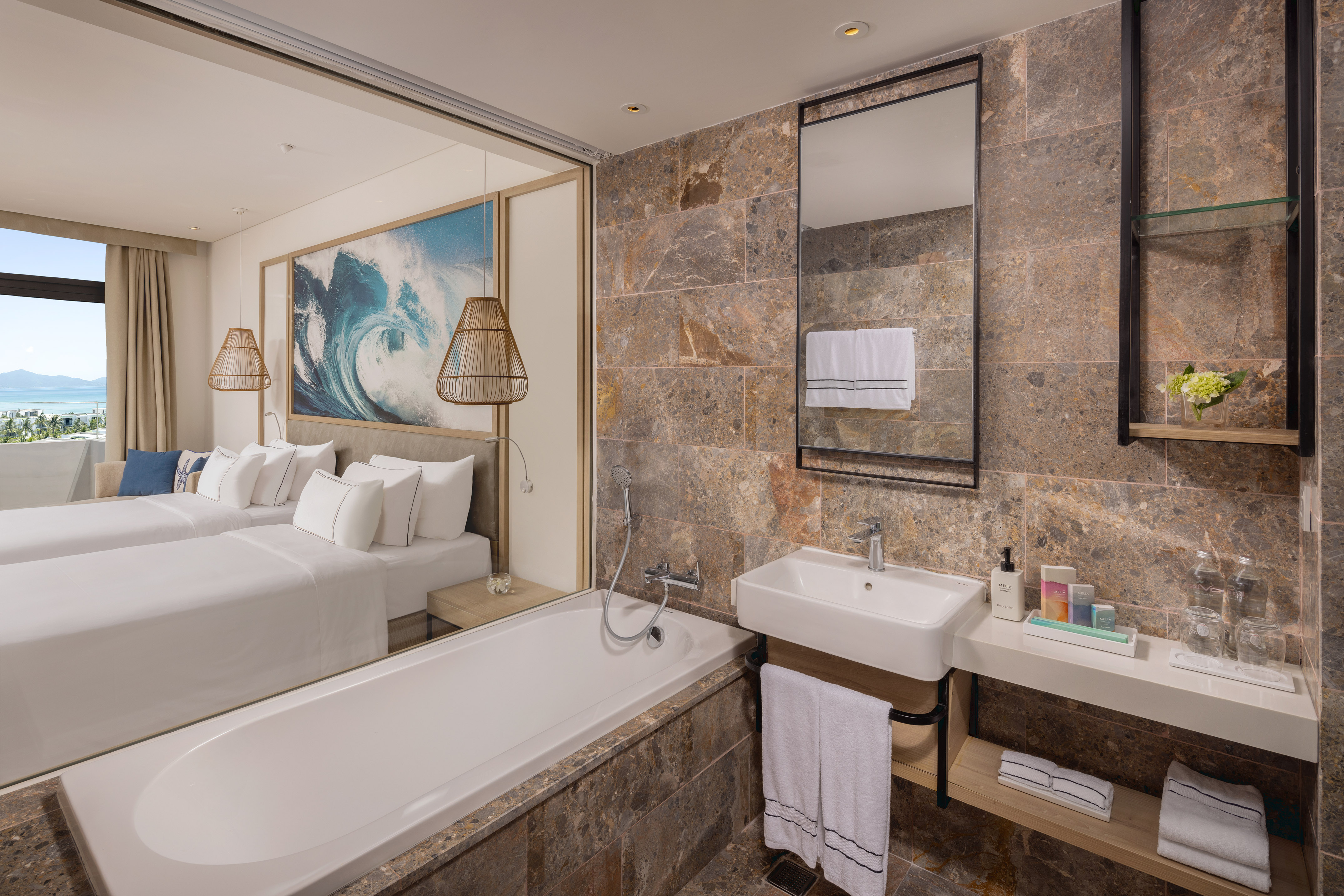 a bathroom with a bed and a bathtub