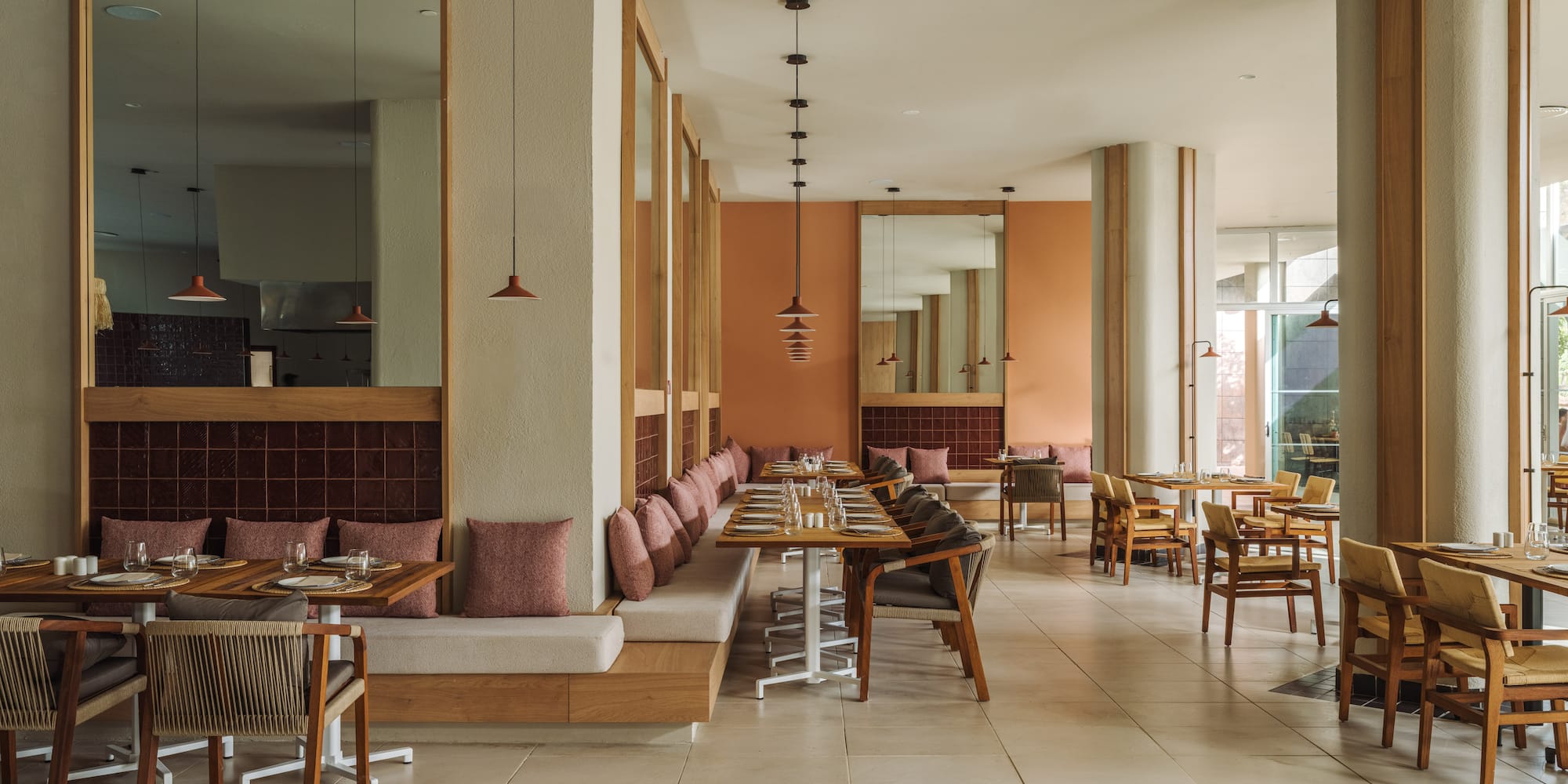 a restaurant with tables and chairs