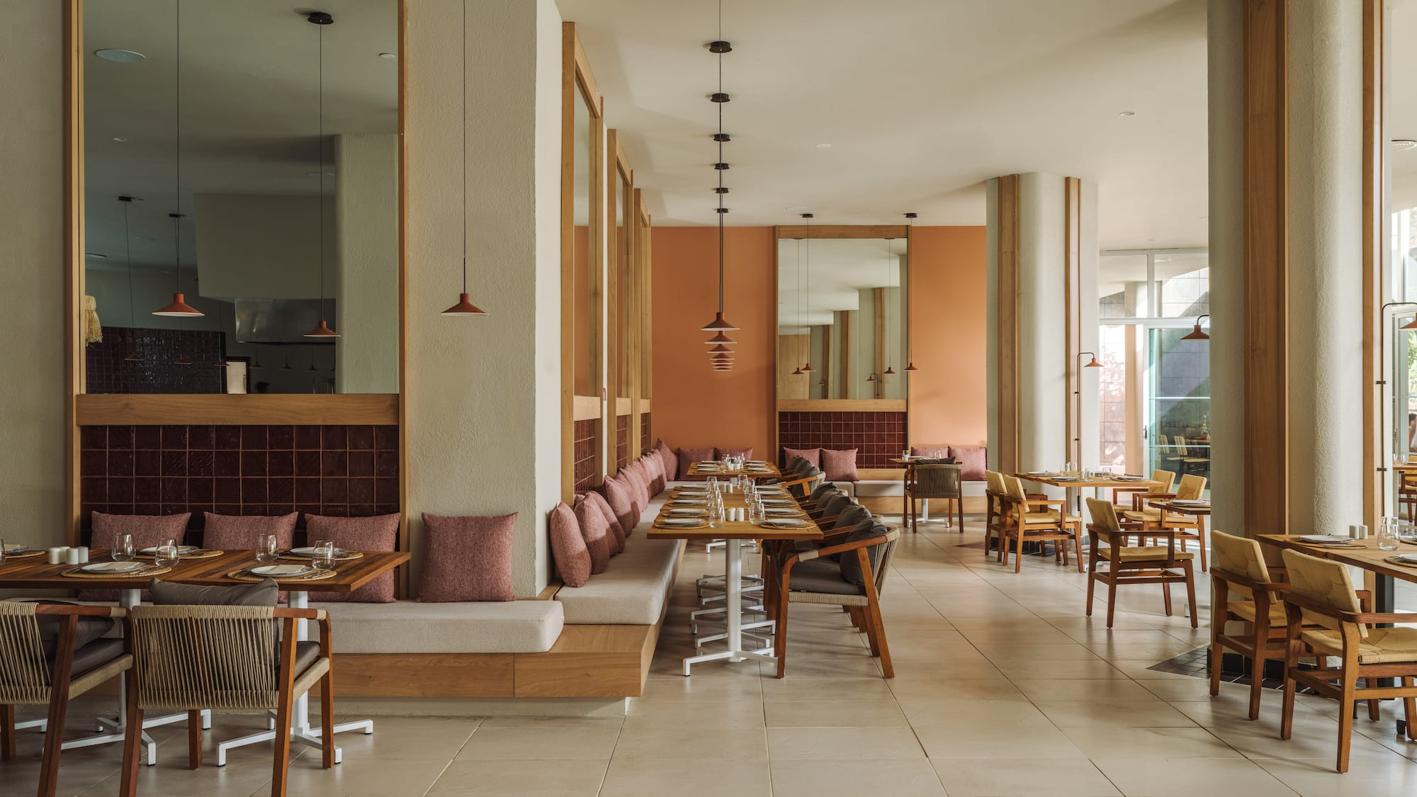 a restaurant with tables and chairs