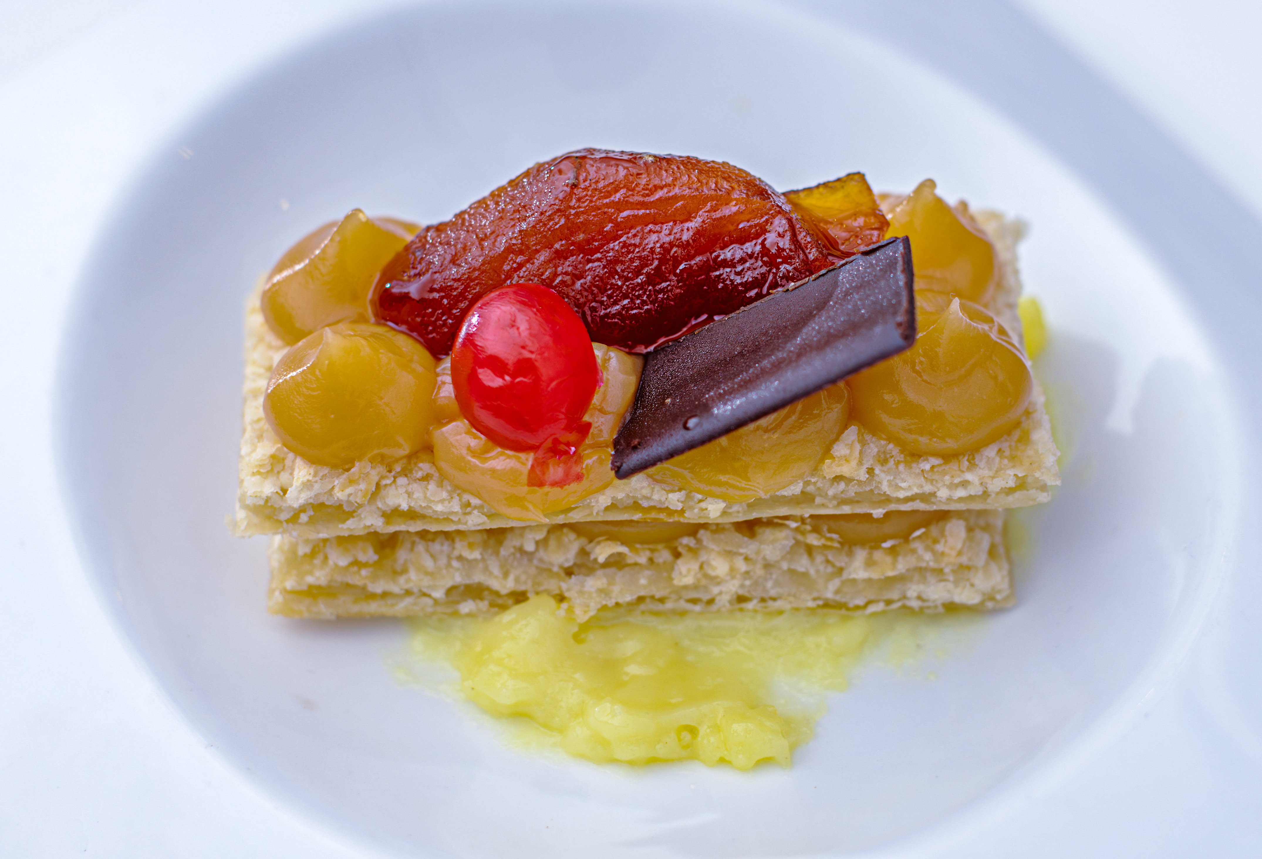 a plate of food on a white surface