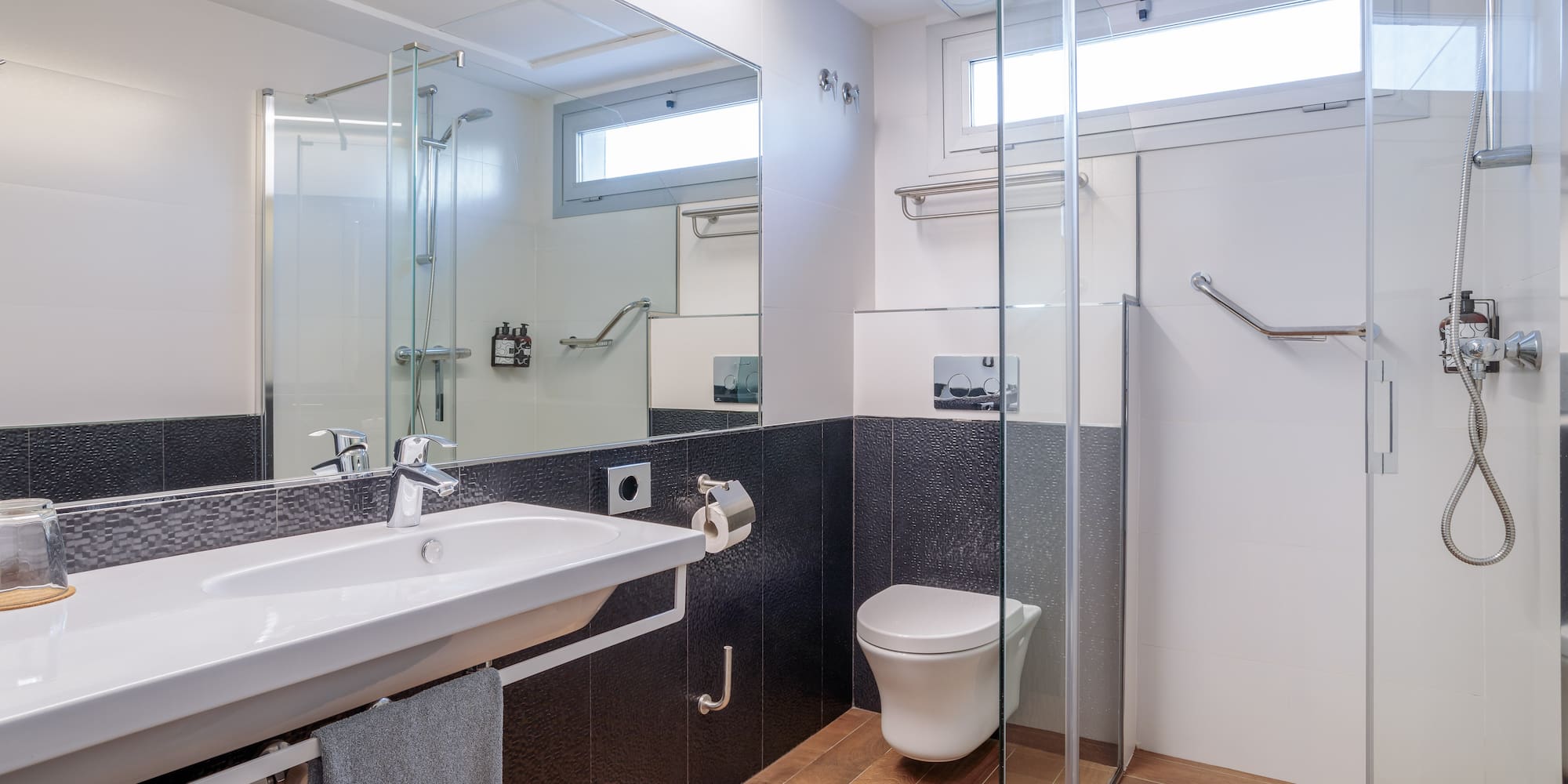 a bathroom with a sink and shower