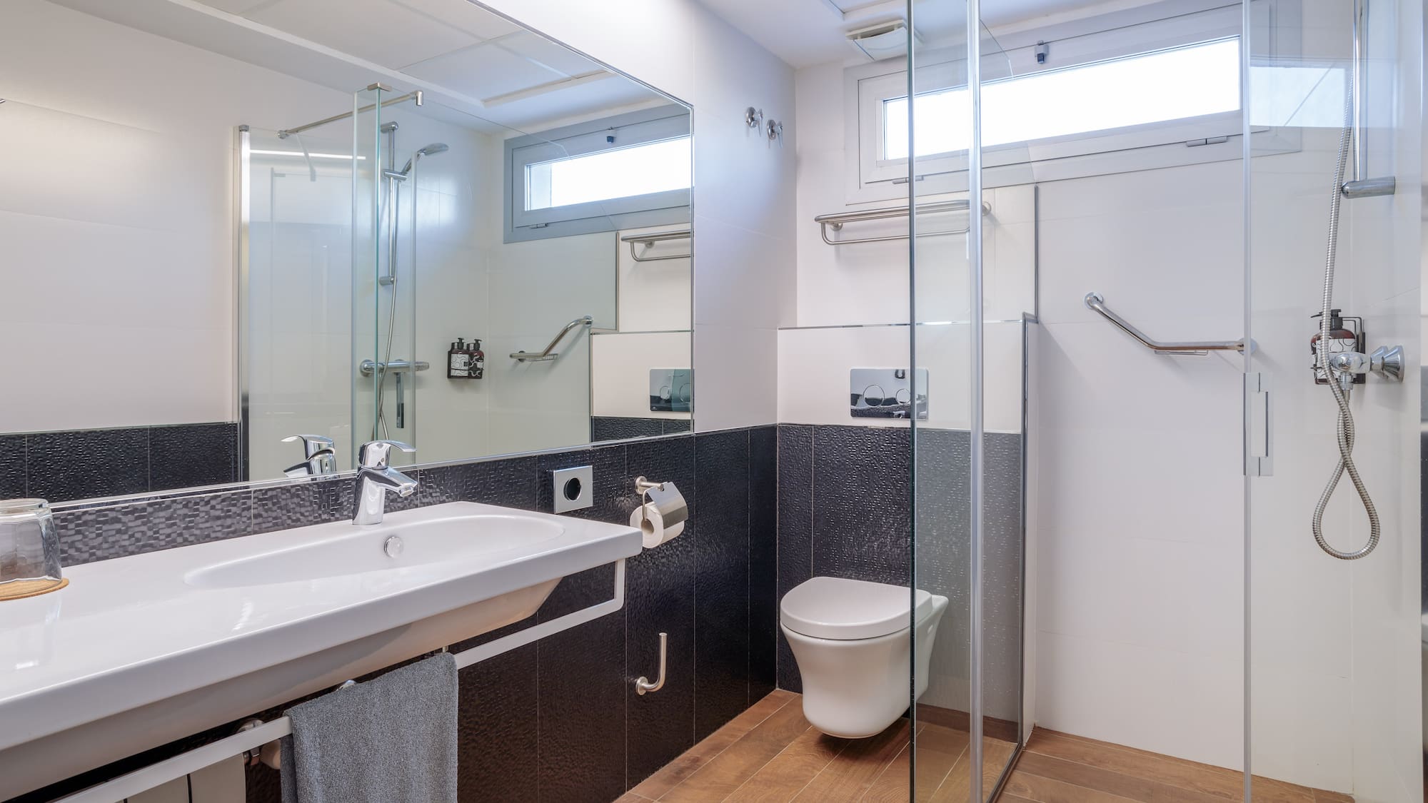 a bathroom with a sink and shower