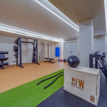a room with a box of exercise equipment