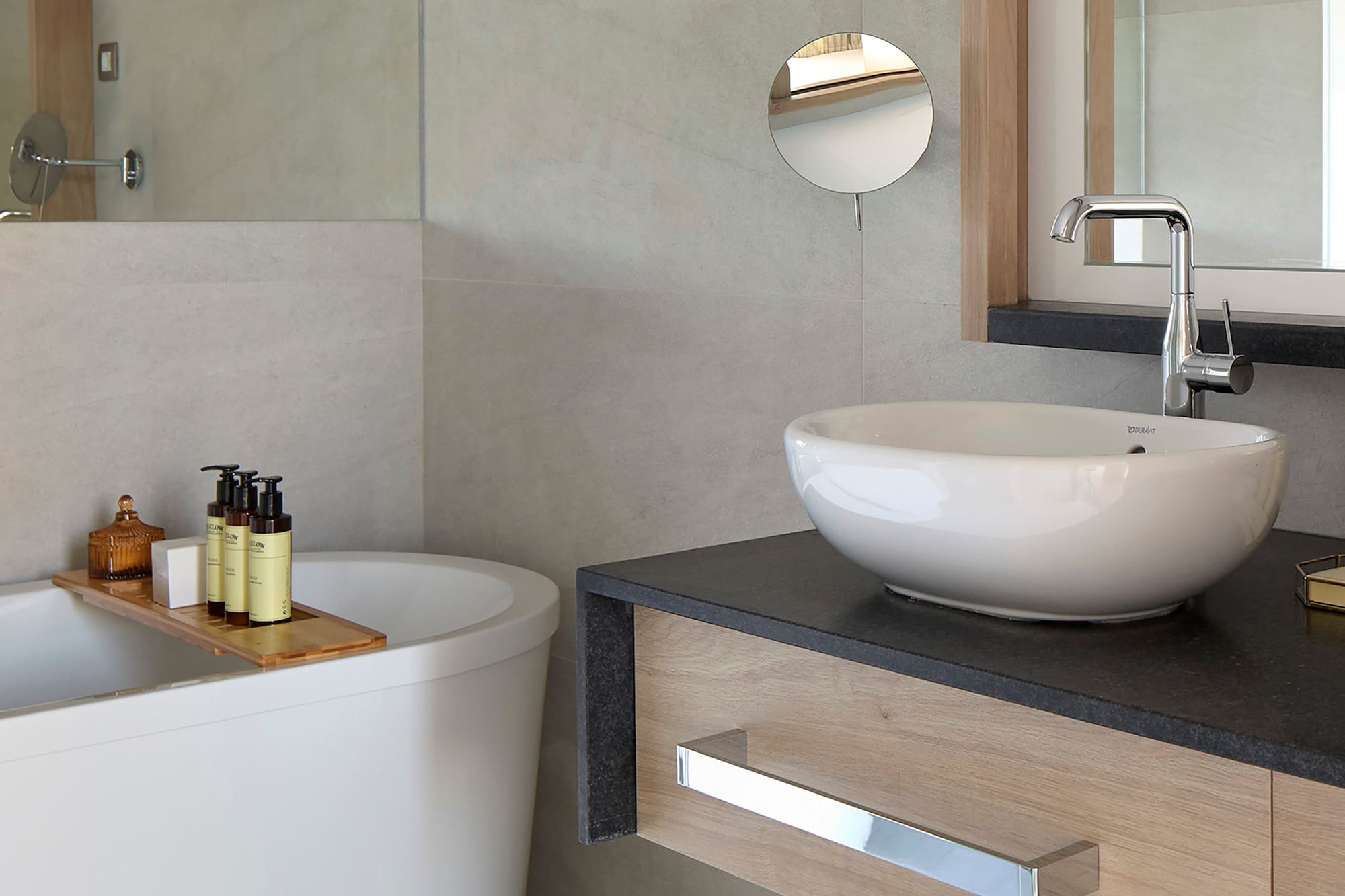 a bathroom with a sink and tub