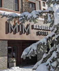 a building with snow on the side