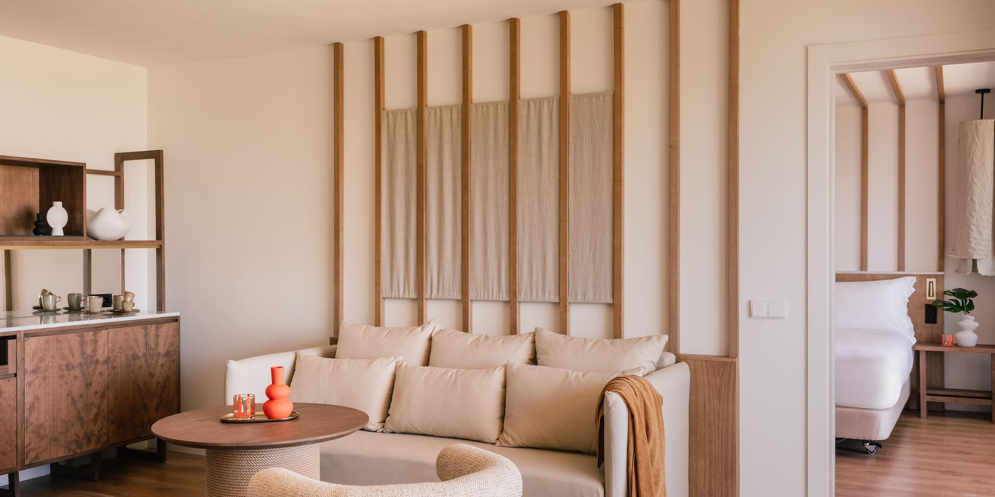 a living room with a couch and a round table