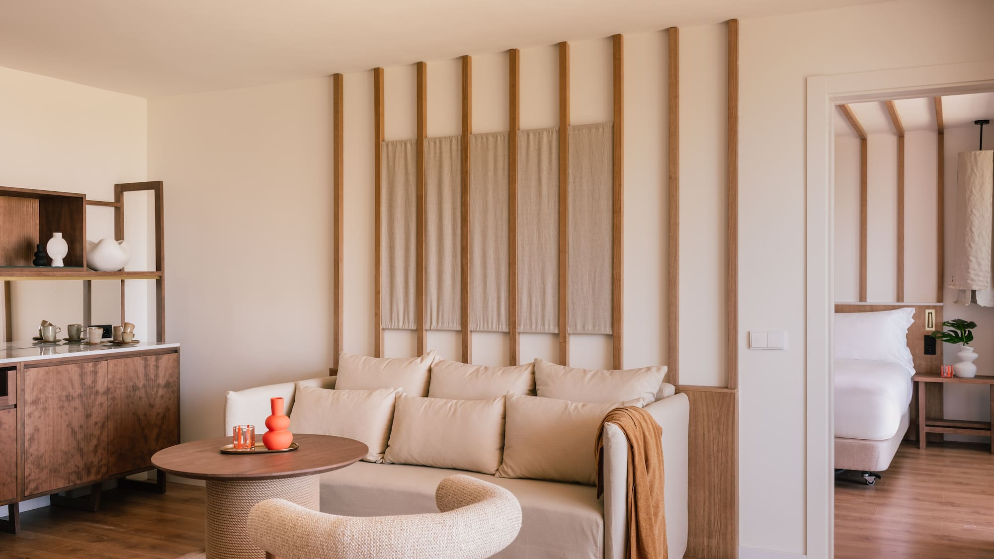 a living room with a couch and a round table