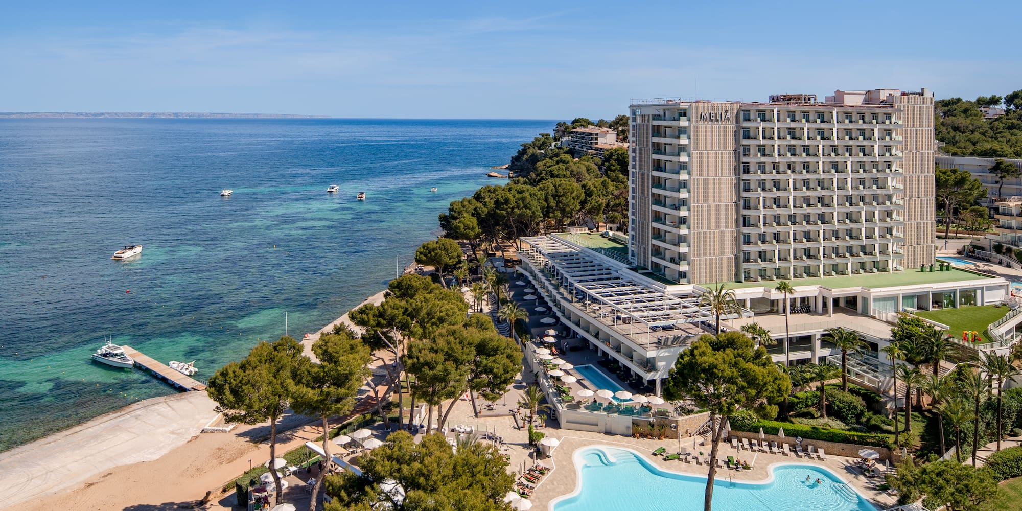 a swimming pool next to a building