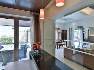 a room with a glass door and a glass wall