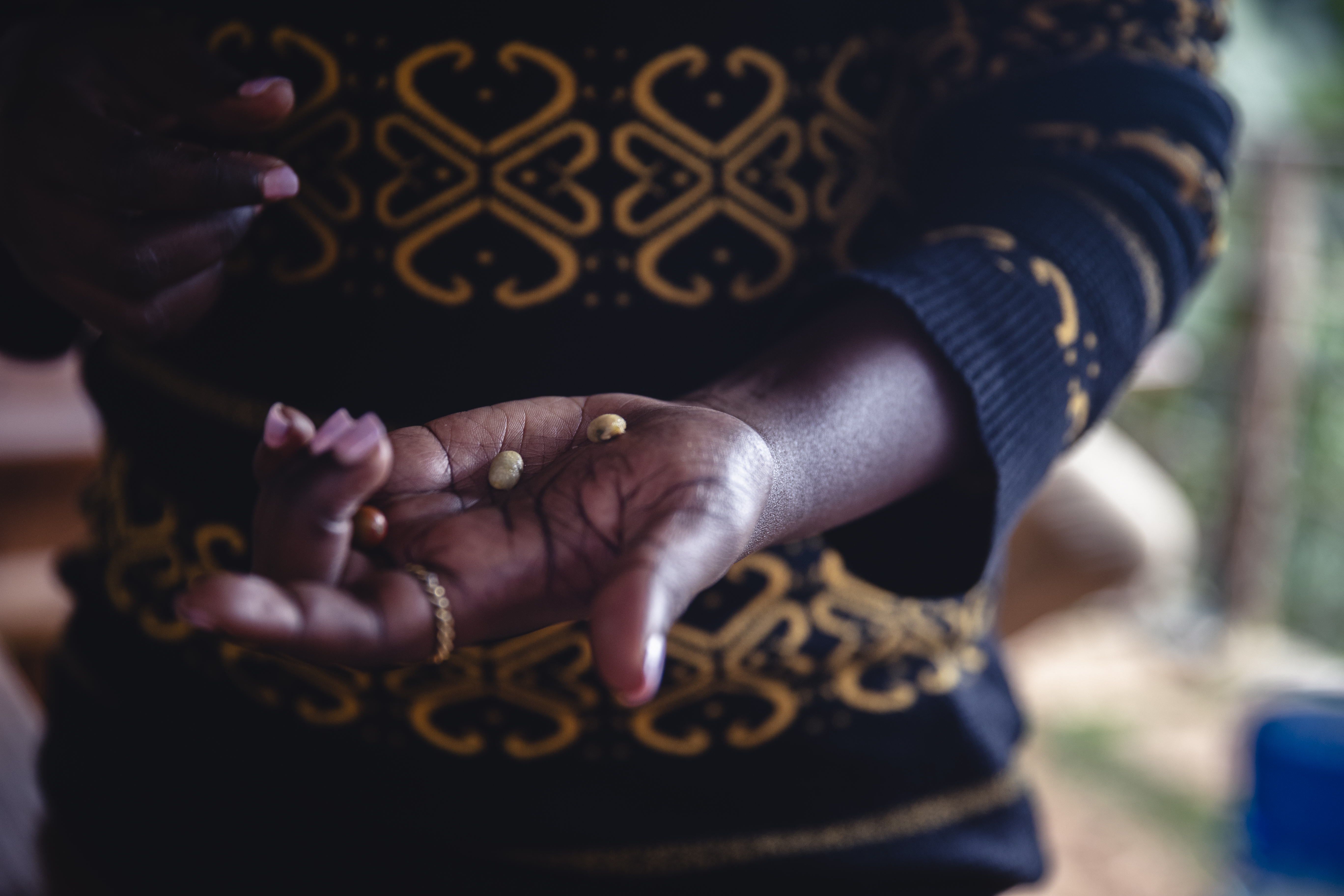 a person holding some pills