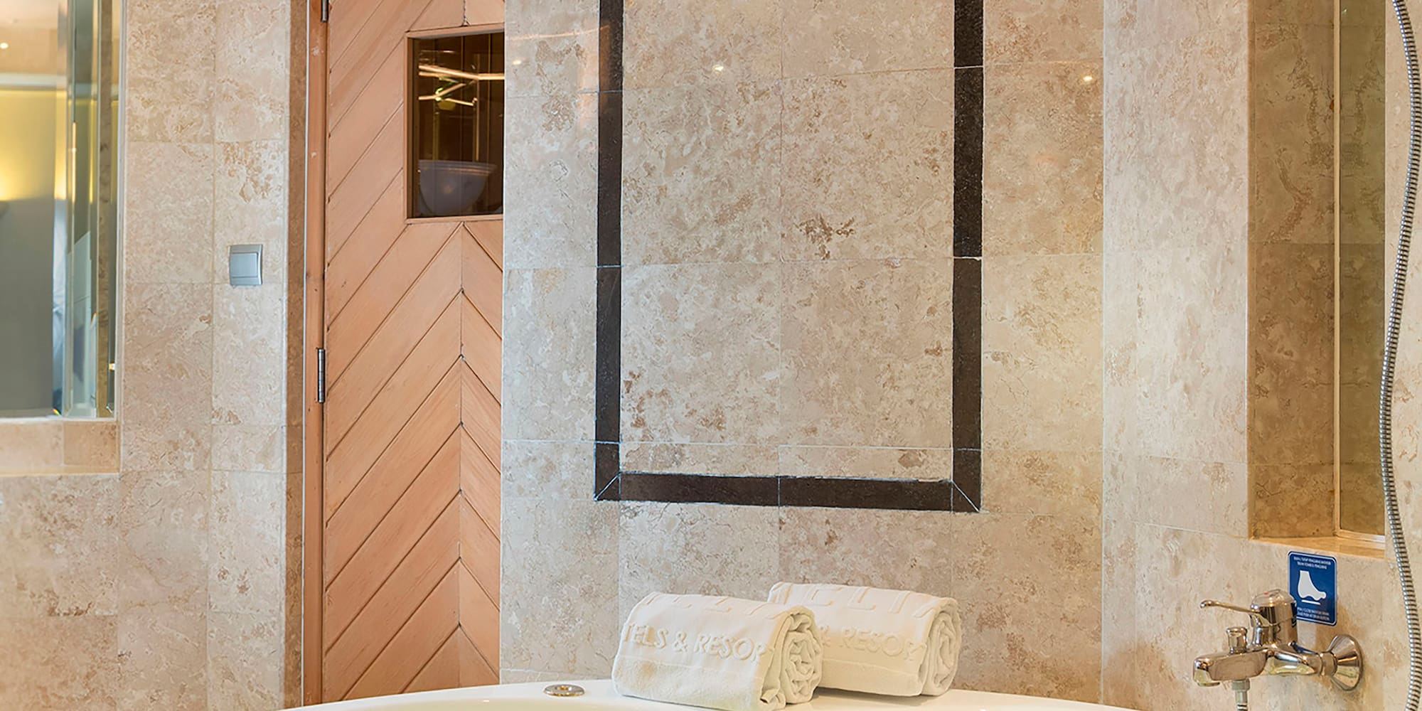 a large bathtub in a bathroom