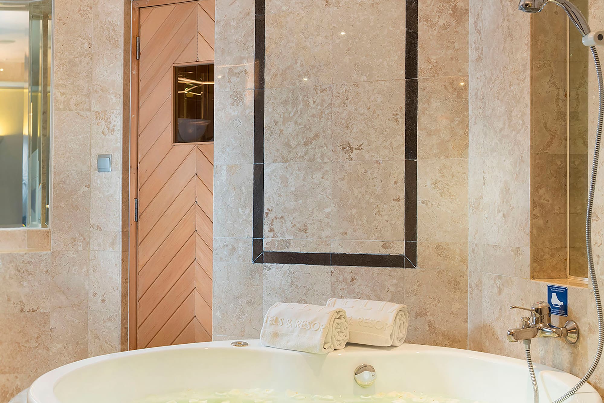 a large bathtub in a bathroom