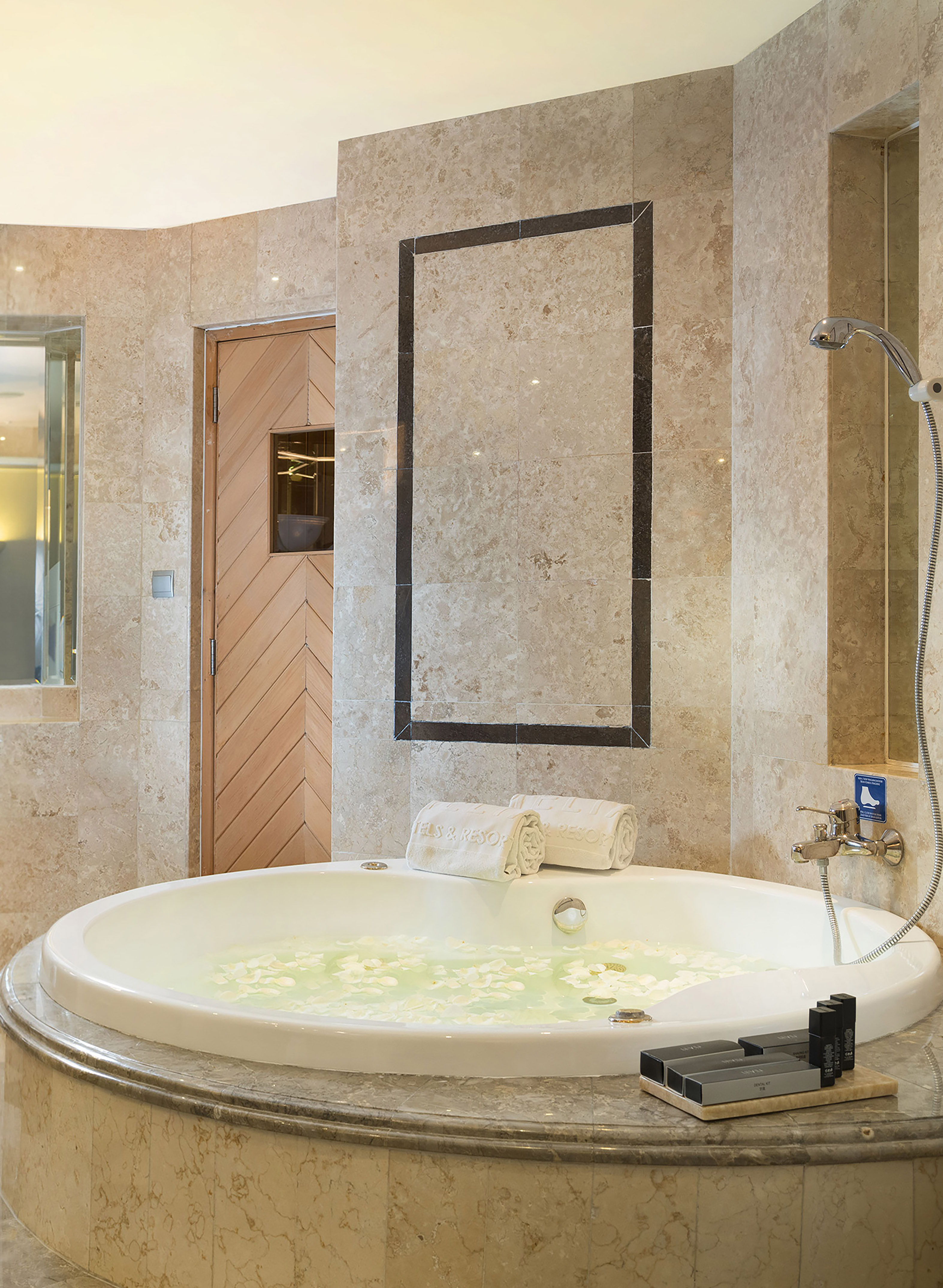 a large bathtub in a bathroom