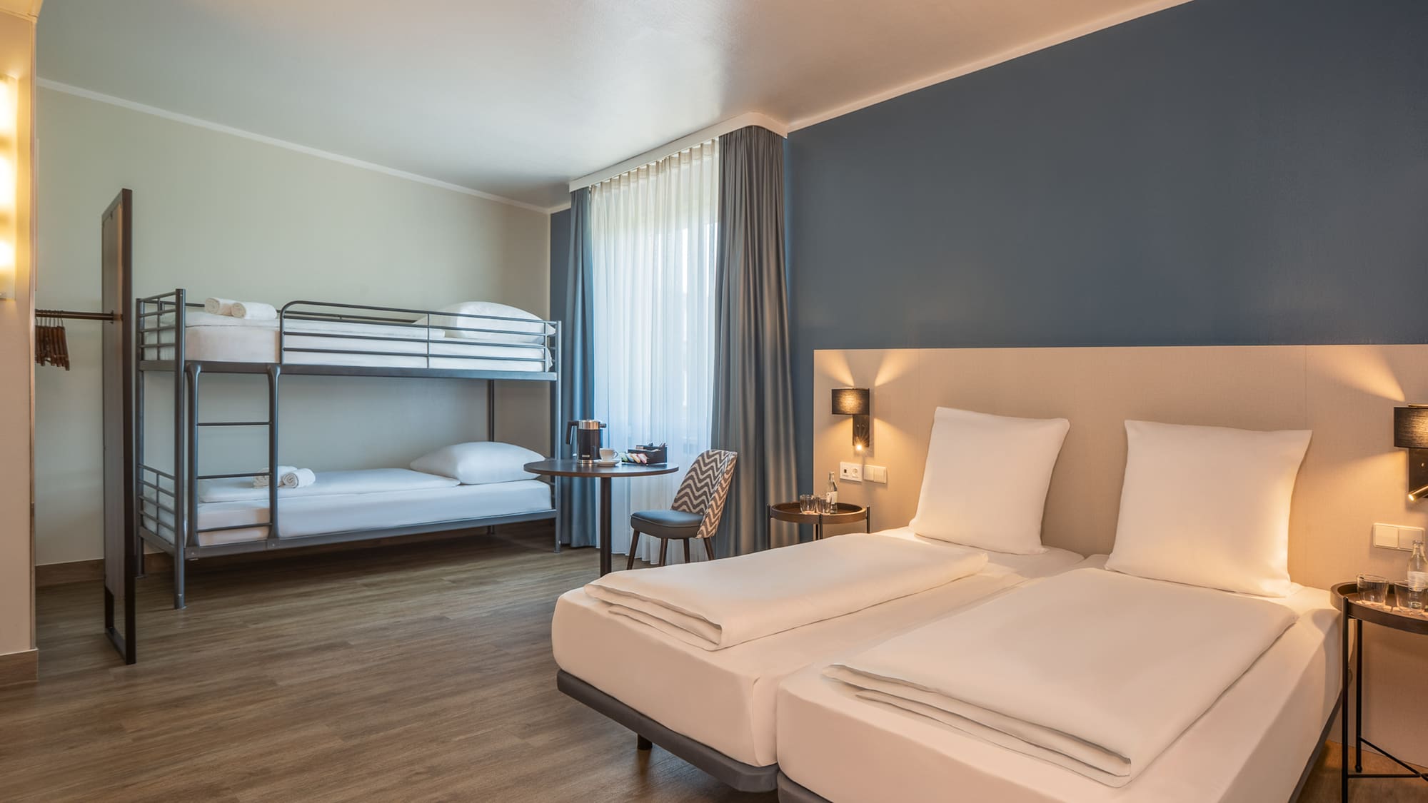 a room with bunk beds and a table