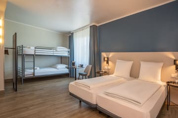 a room with bunk beds and a table