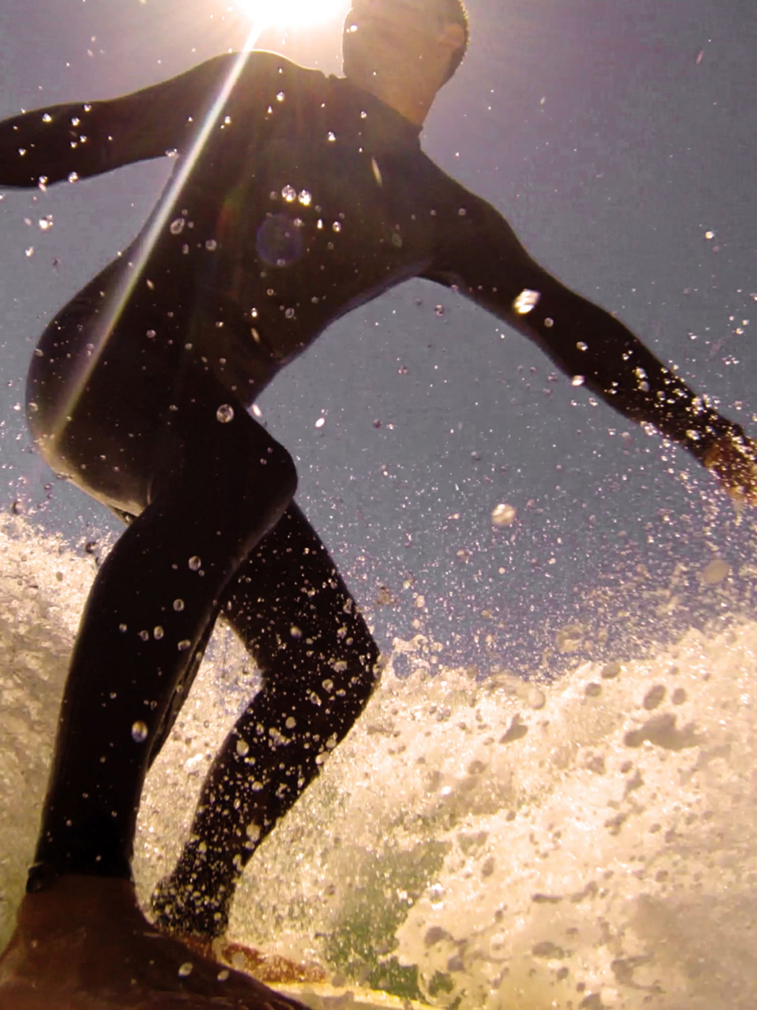 a man surfing on a wave