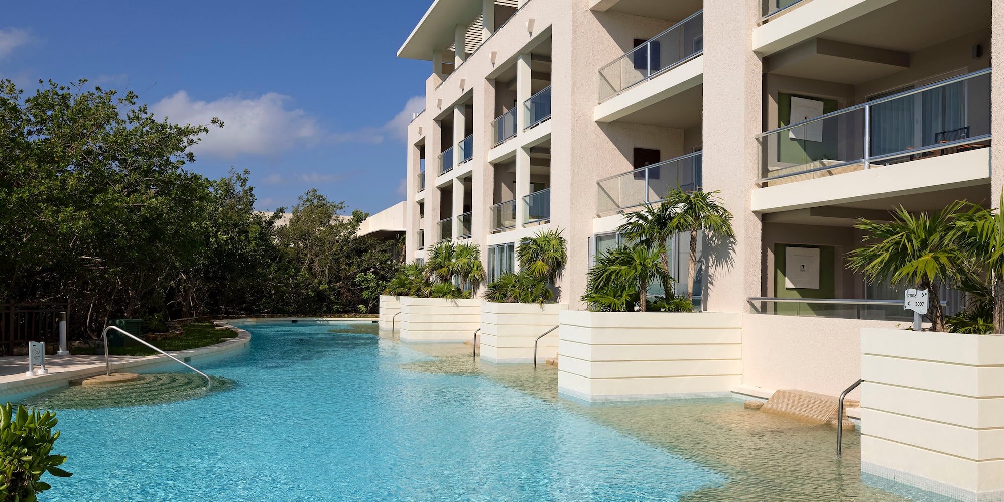 a pool in front of a building
