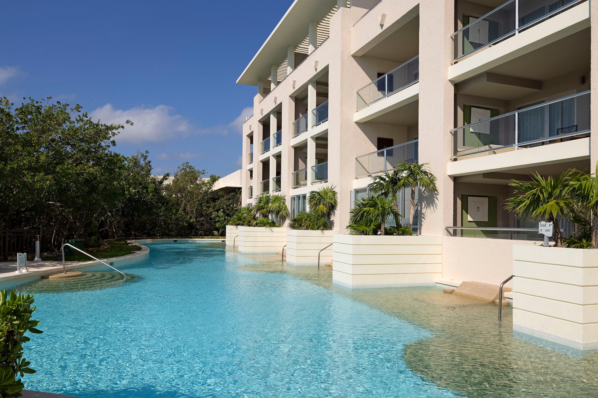 a pool in front of a building