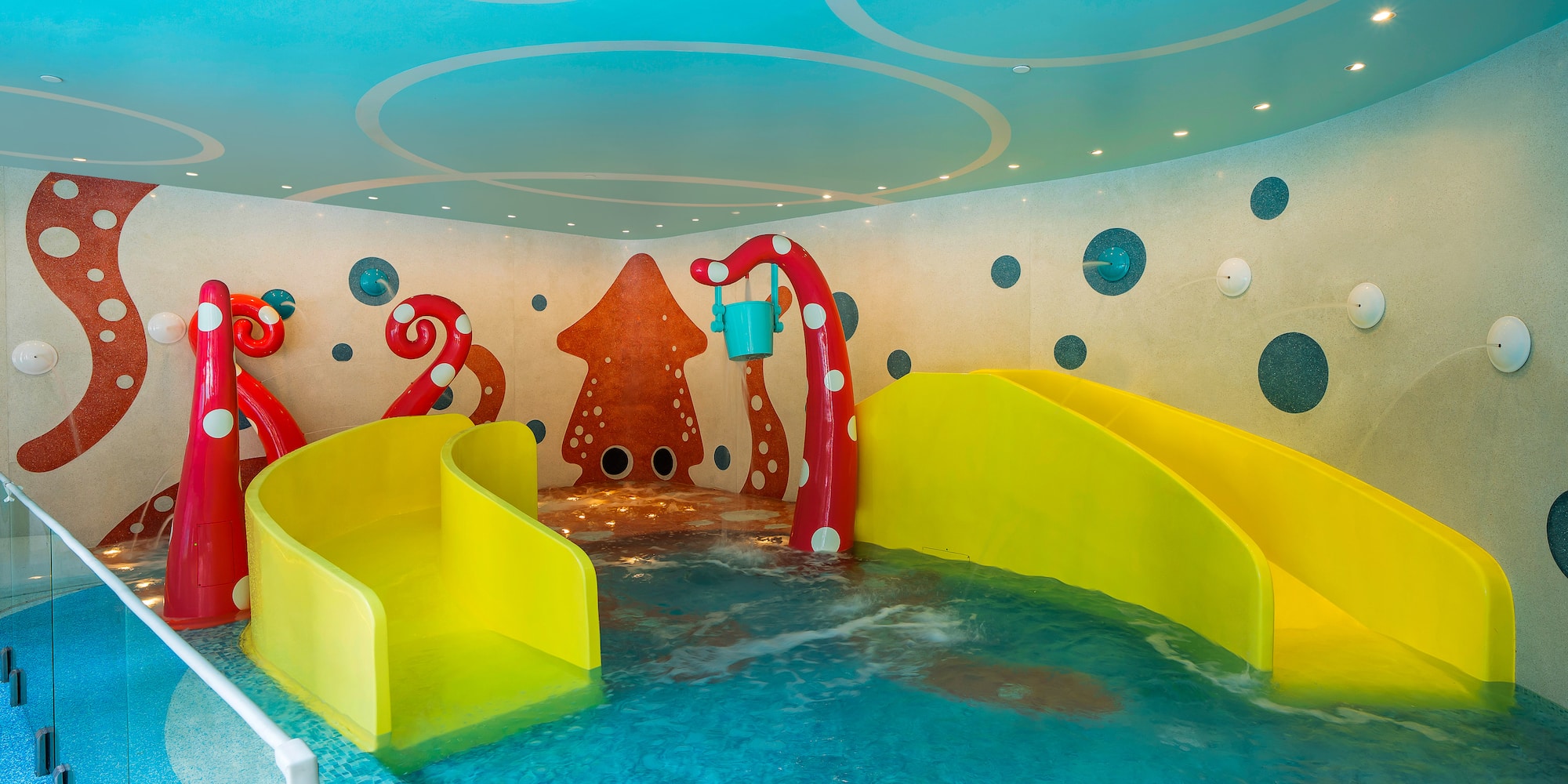 a water slide in a pool