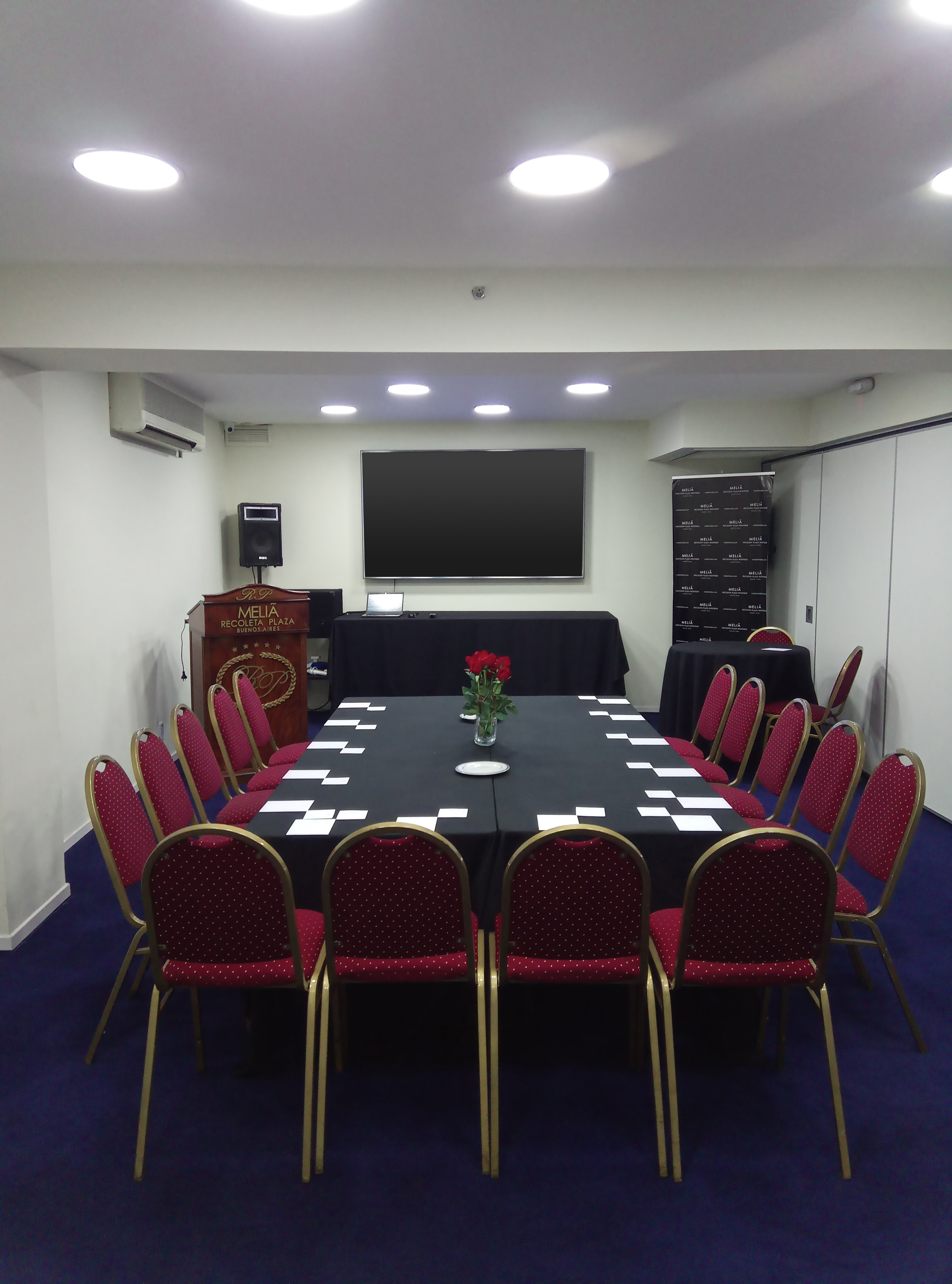 a room with a table and chairs