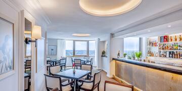 a room with tables and chairs