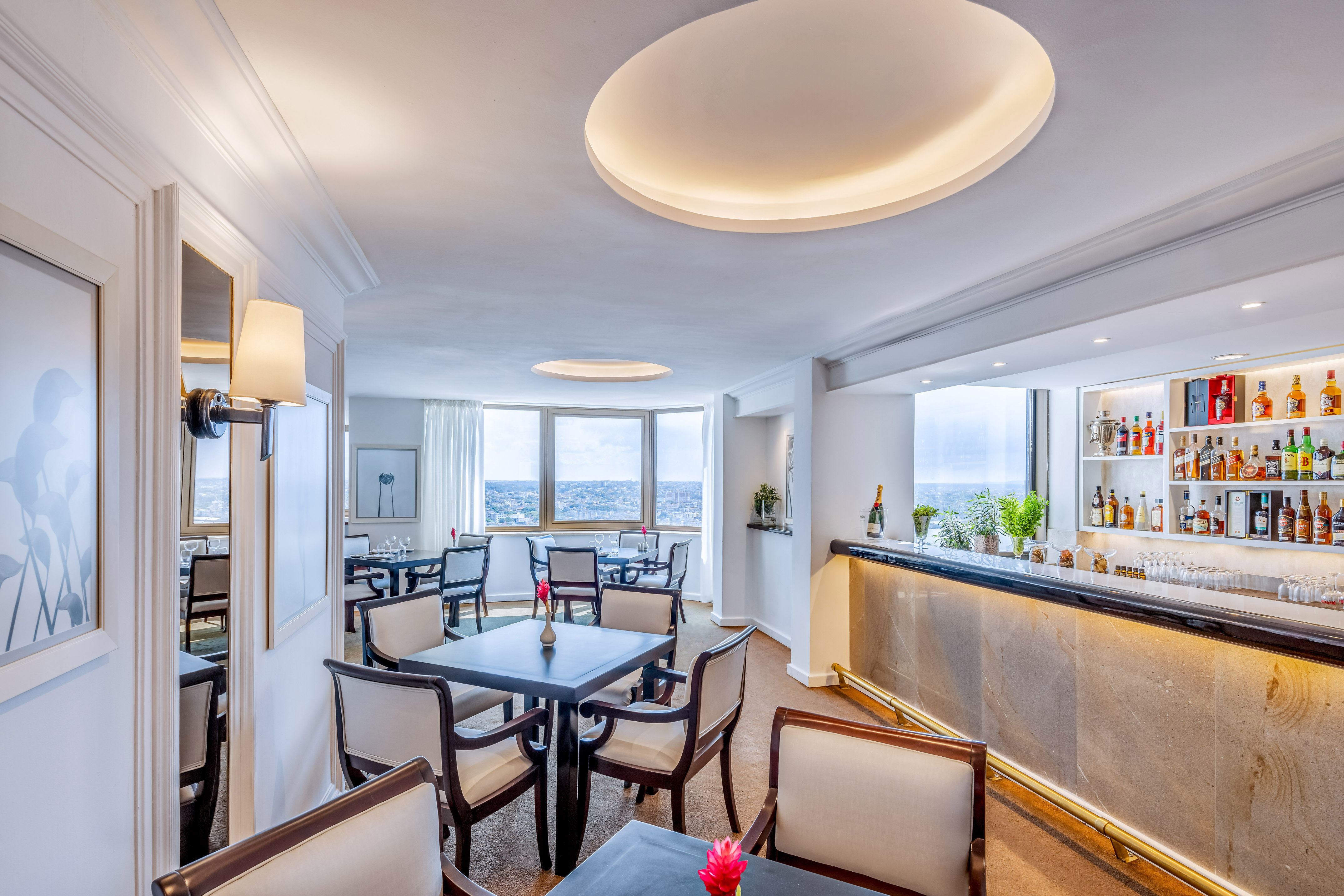 a room with tables and chairs