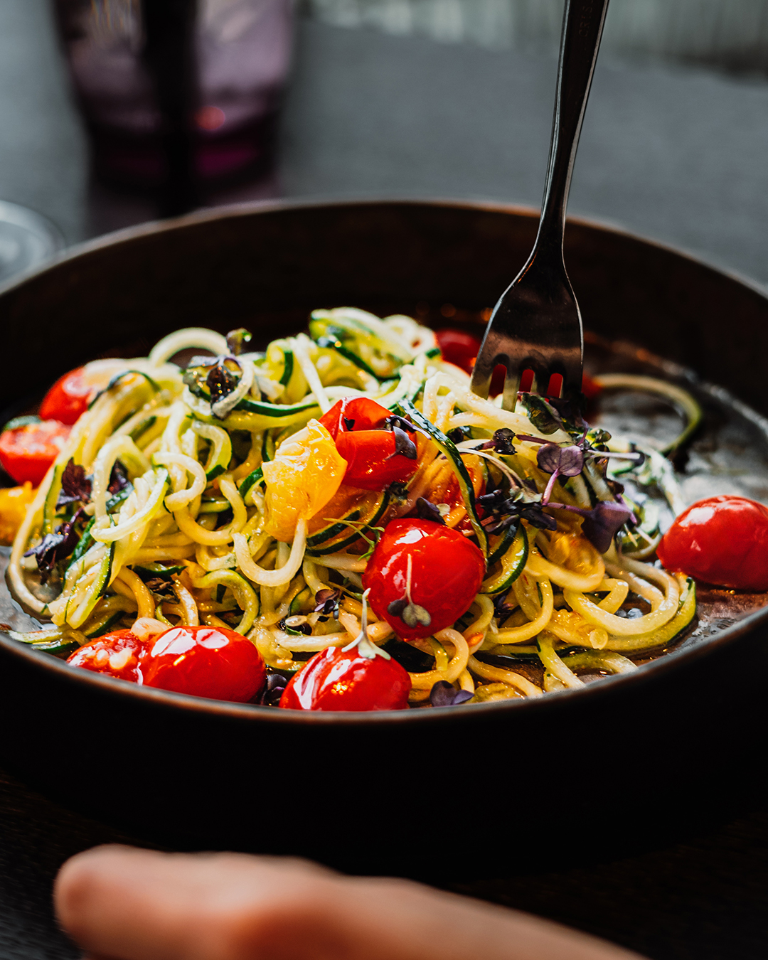 a bowl of food with a fork