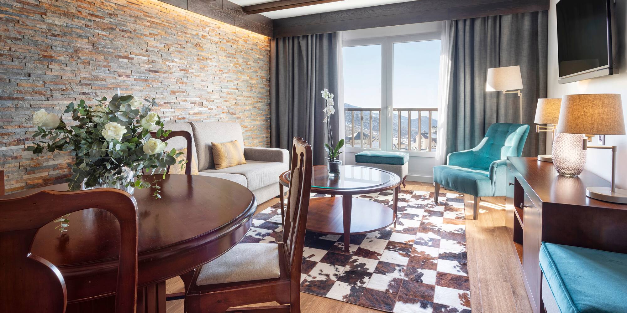 a living room with a couch and a table