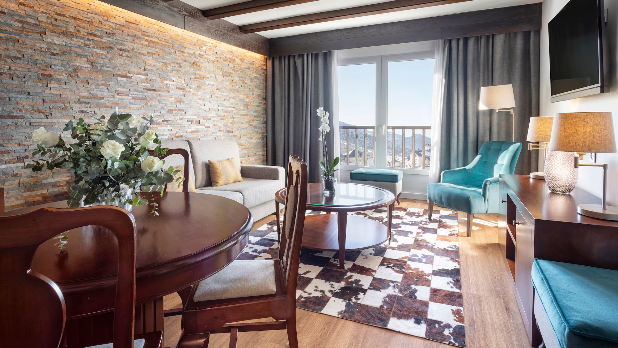 a living room with a couch and a table