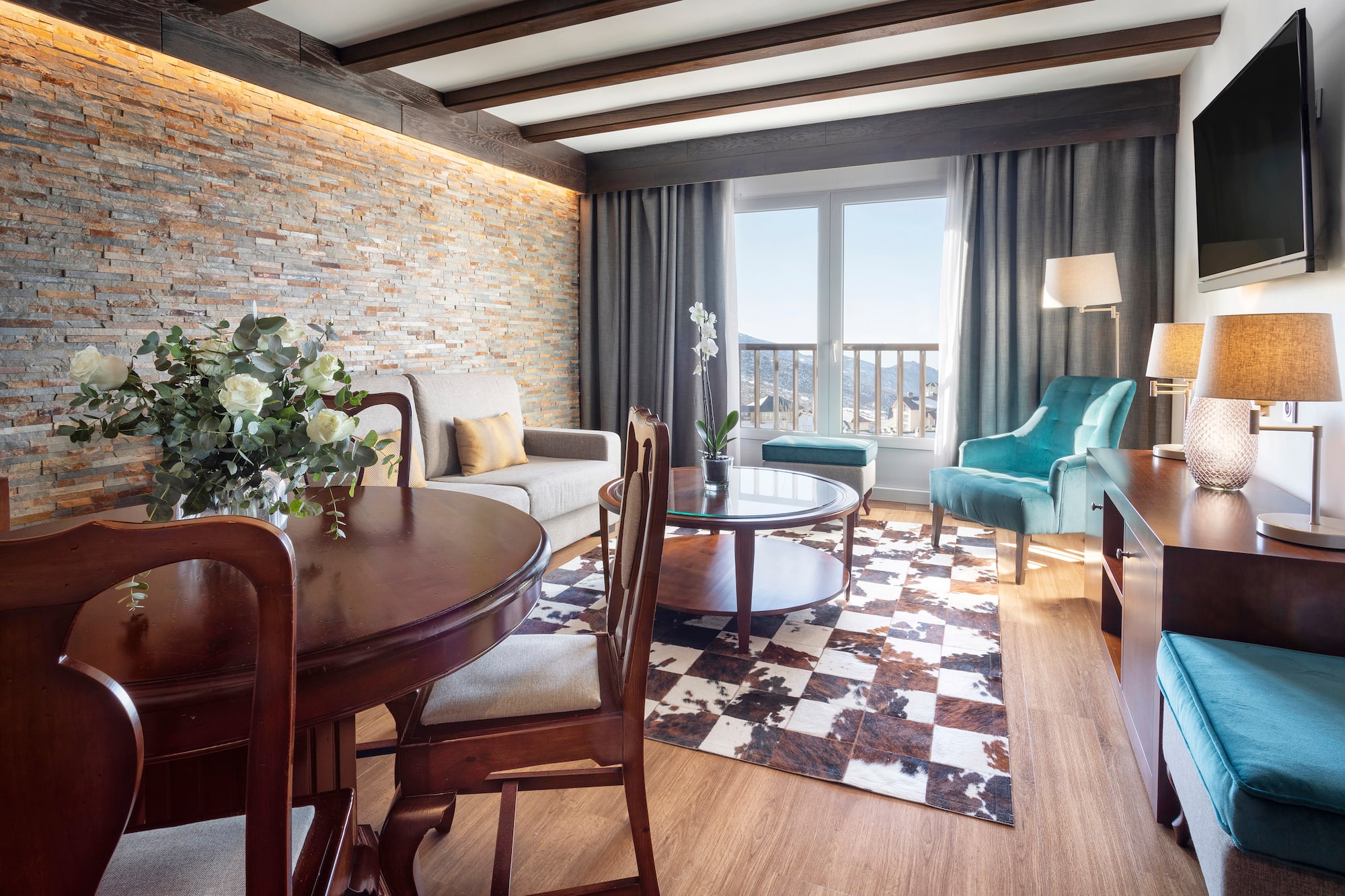 a living room with a couch and a table