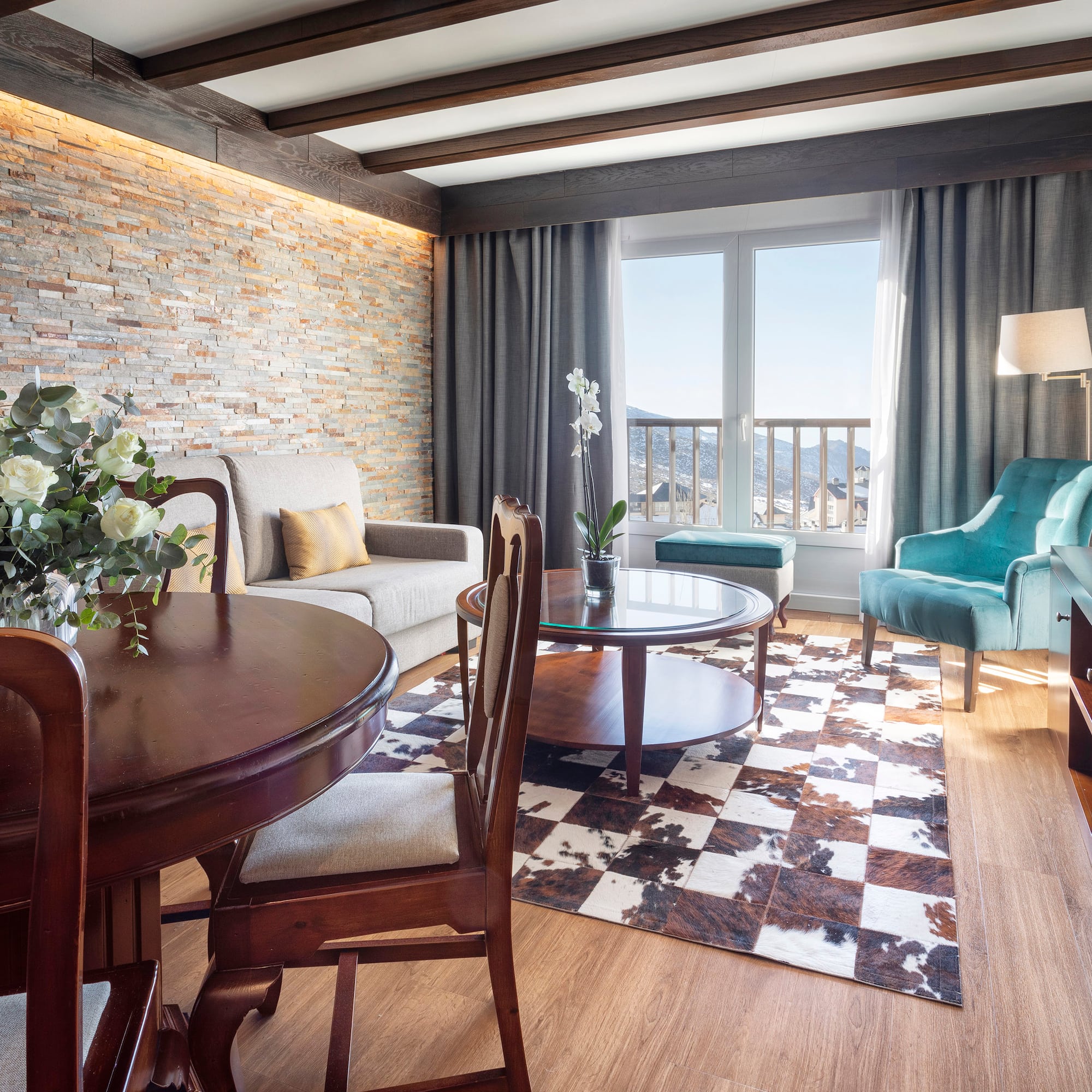 a living room with a couch and a table