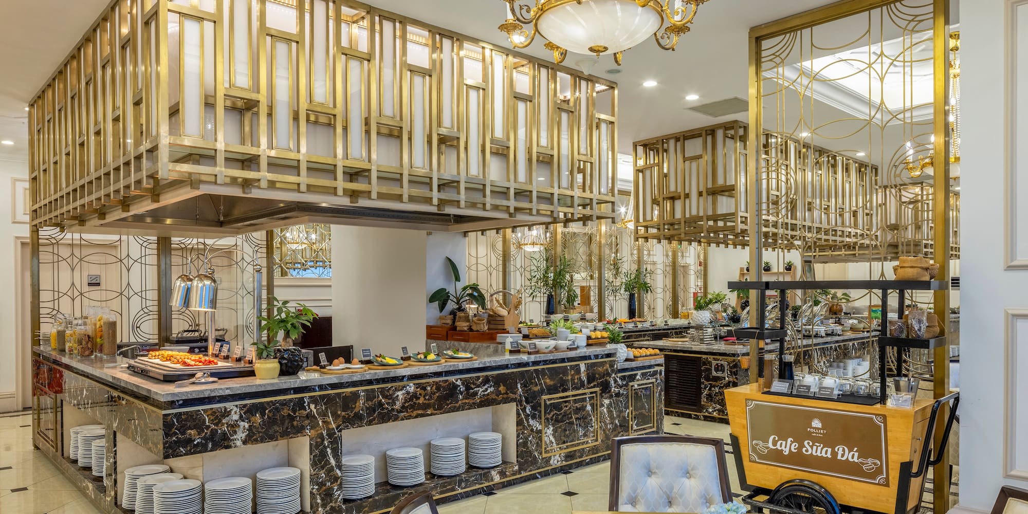 a restaurant with a large counter and chairs