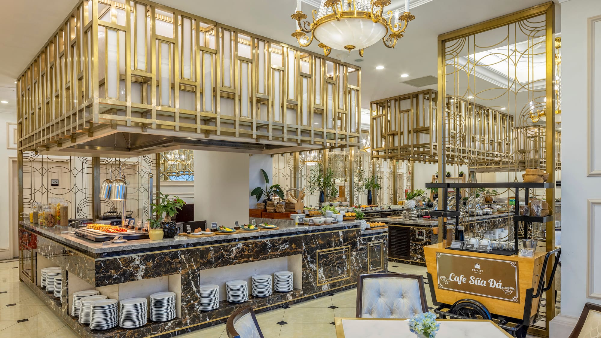 a restaurant with a large counter and chairs